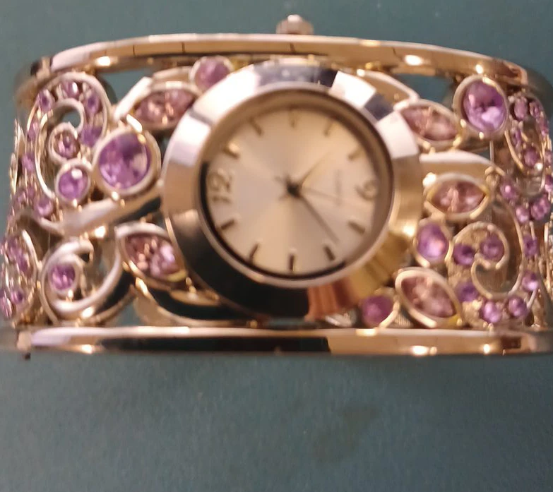 Women's Gold Tone Cuff Watch with Purple Rhinestones