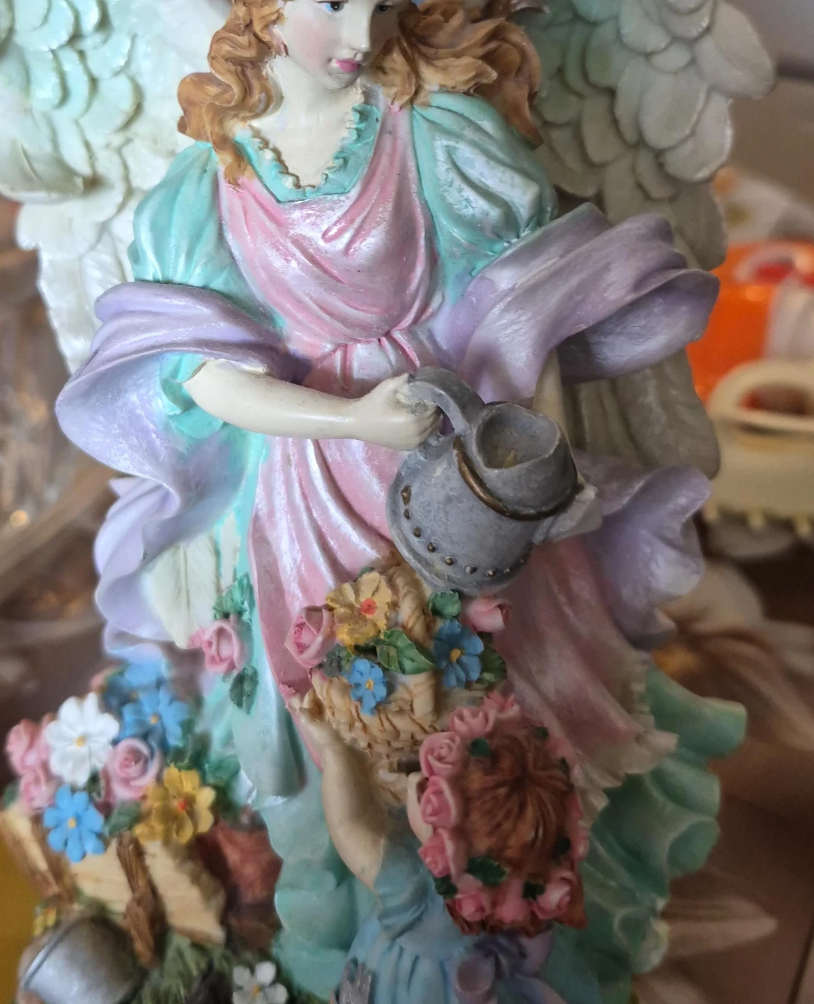 Angel Figurine with Watering Can and Flowers