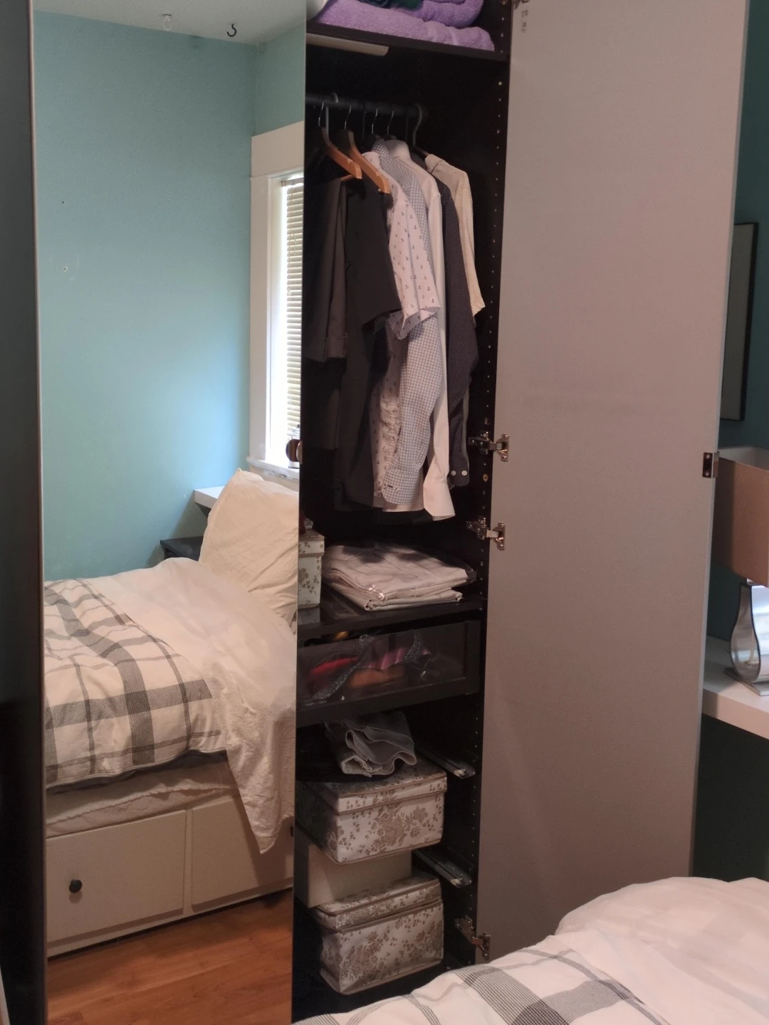 Wardrobe with hanging rail and shelves