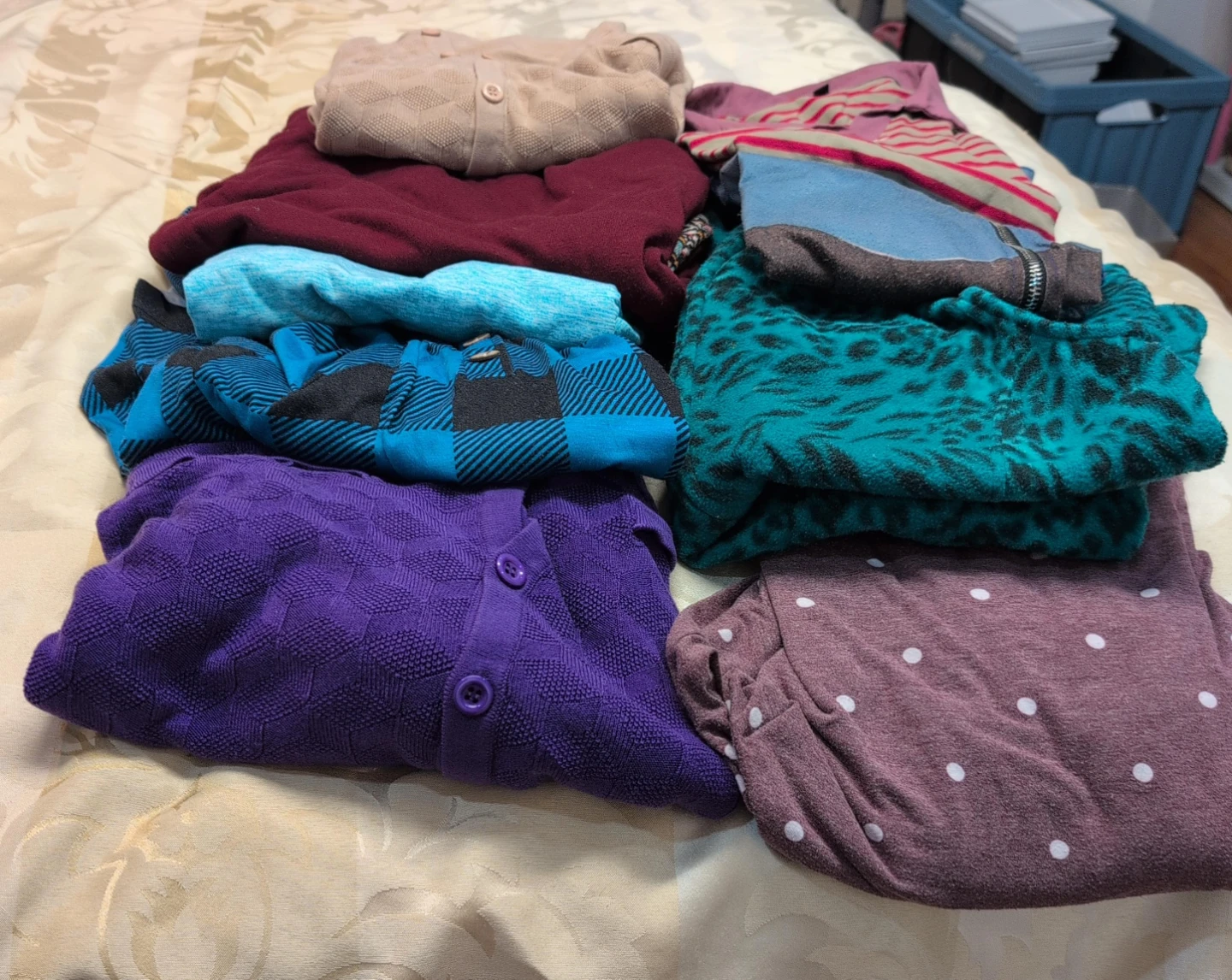 Bundle of women's sweaters and tops$35