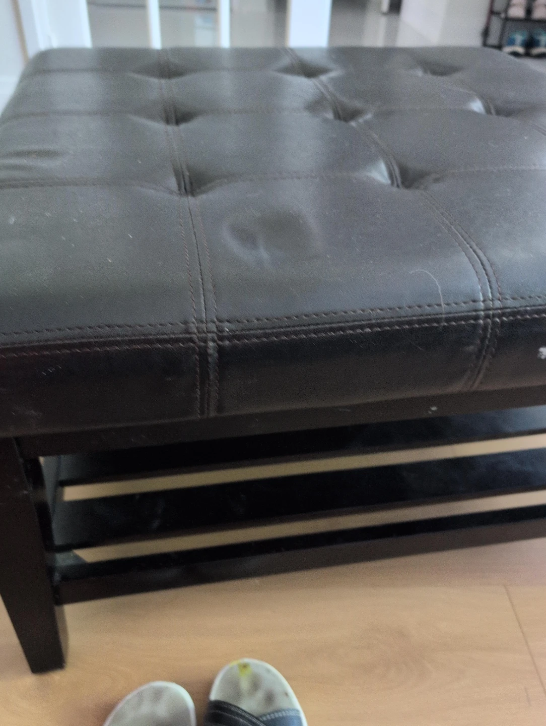 Dark Brown Tufted Storage Ottoman Bench picked up as it