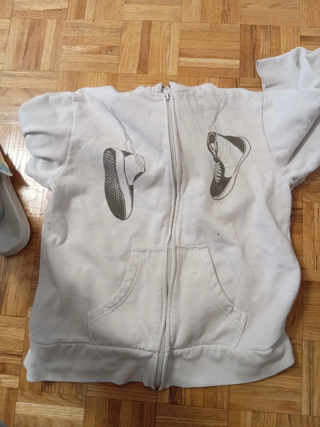 White Zip-Up Hoodie with Sneaker Graphic