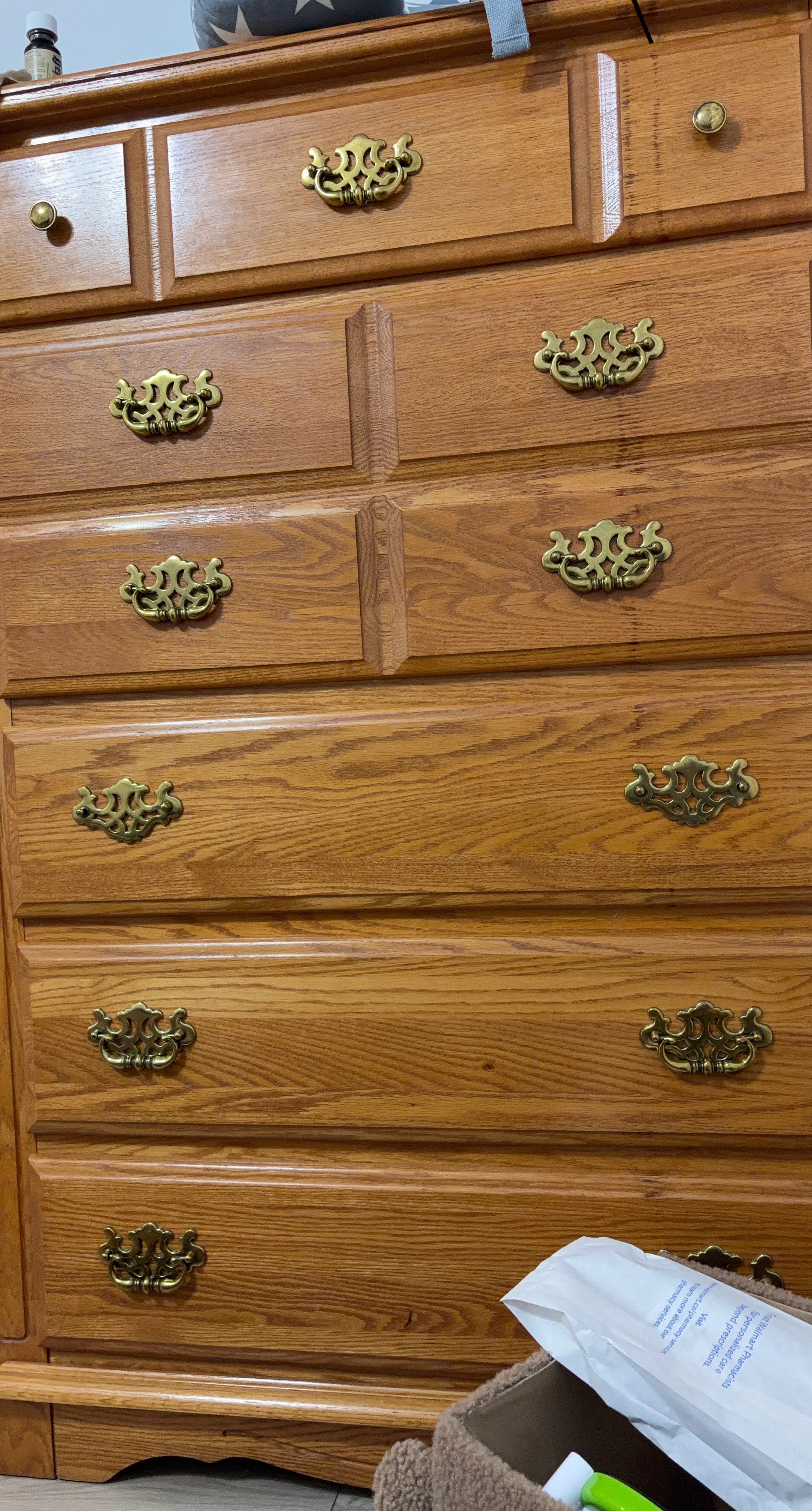 Wooden Dresser with Ornate Brass Handles