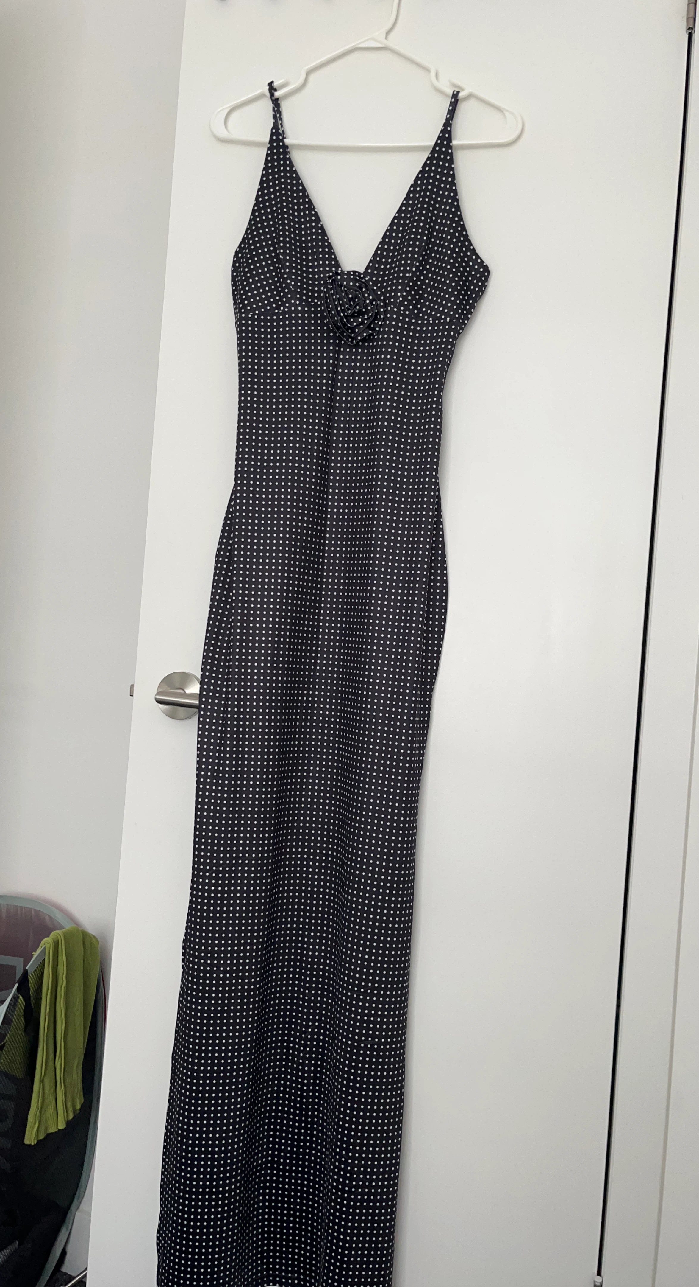 Black and white polka dot maxi dress with rosette detail