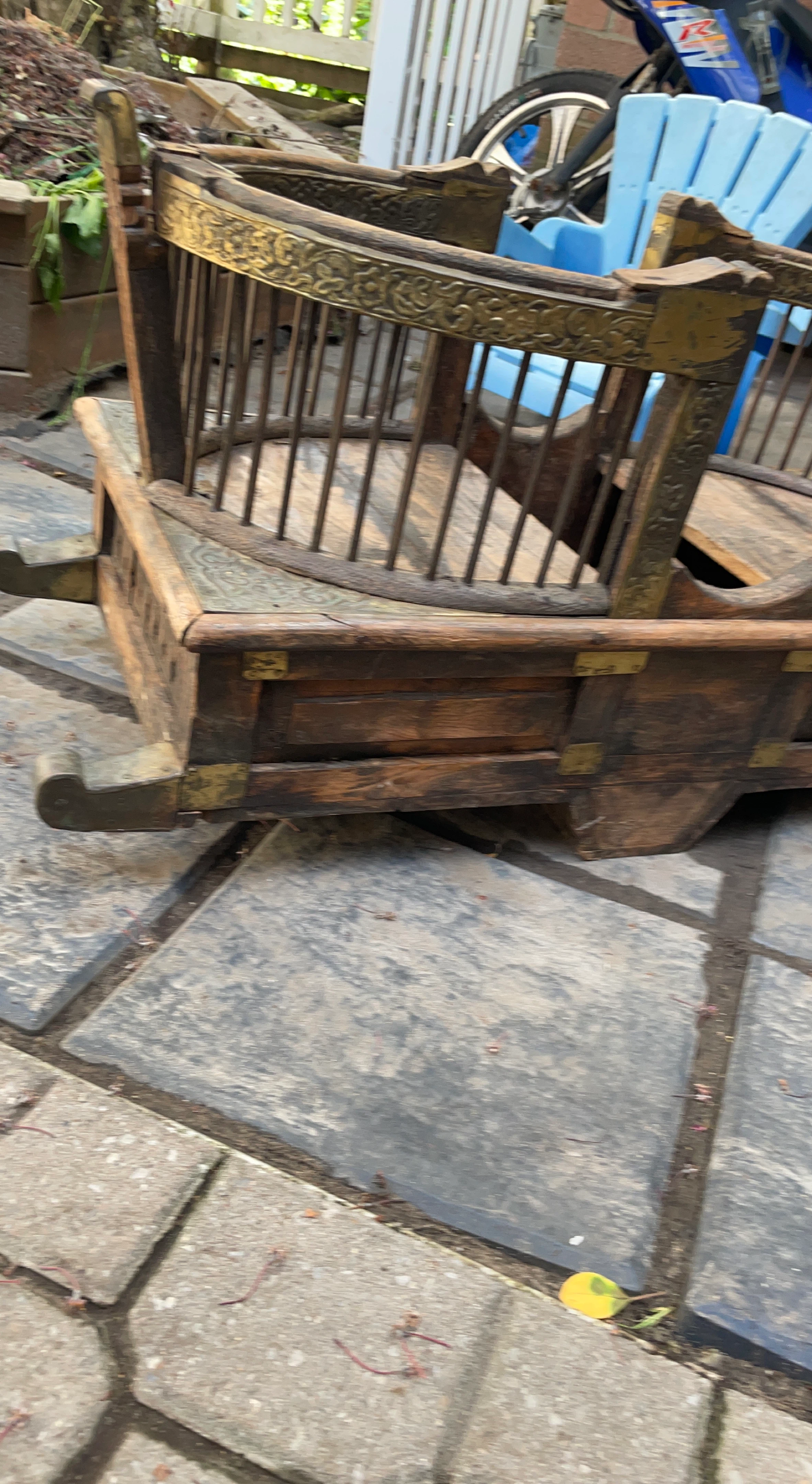 Vintage Wooden Rocking Cradle with Ornate Metal Accents