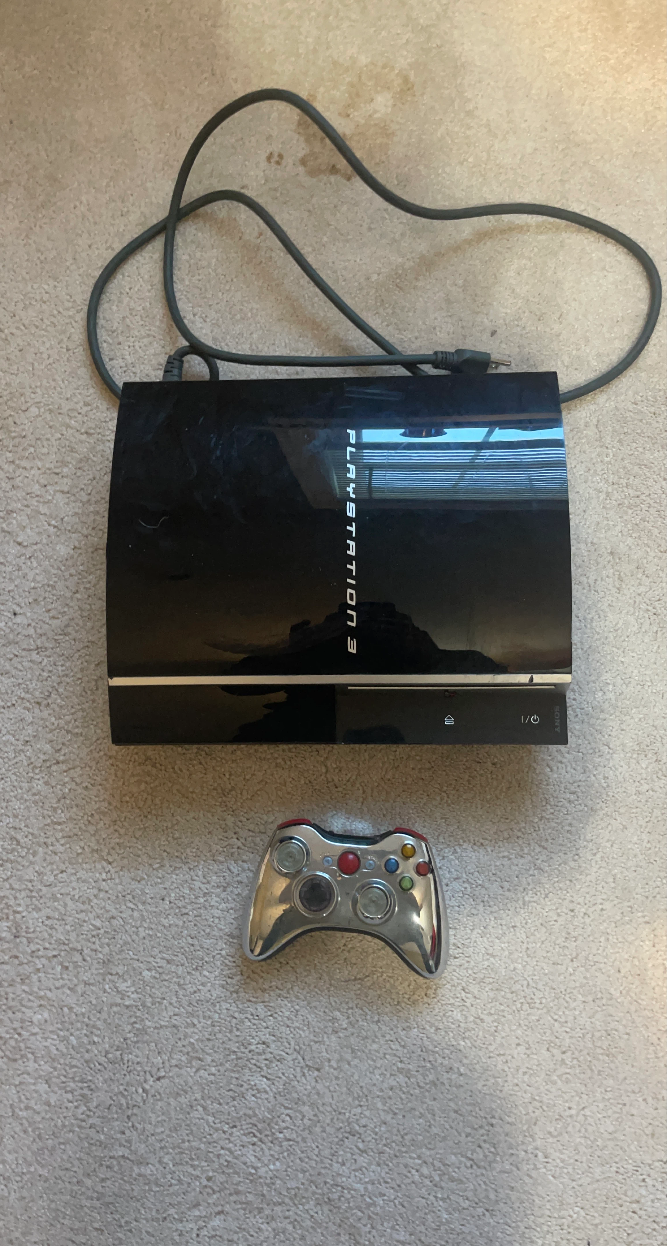 Black Sony PlayStation 3 Console with Controller