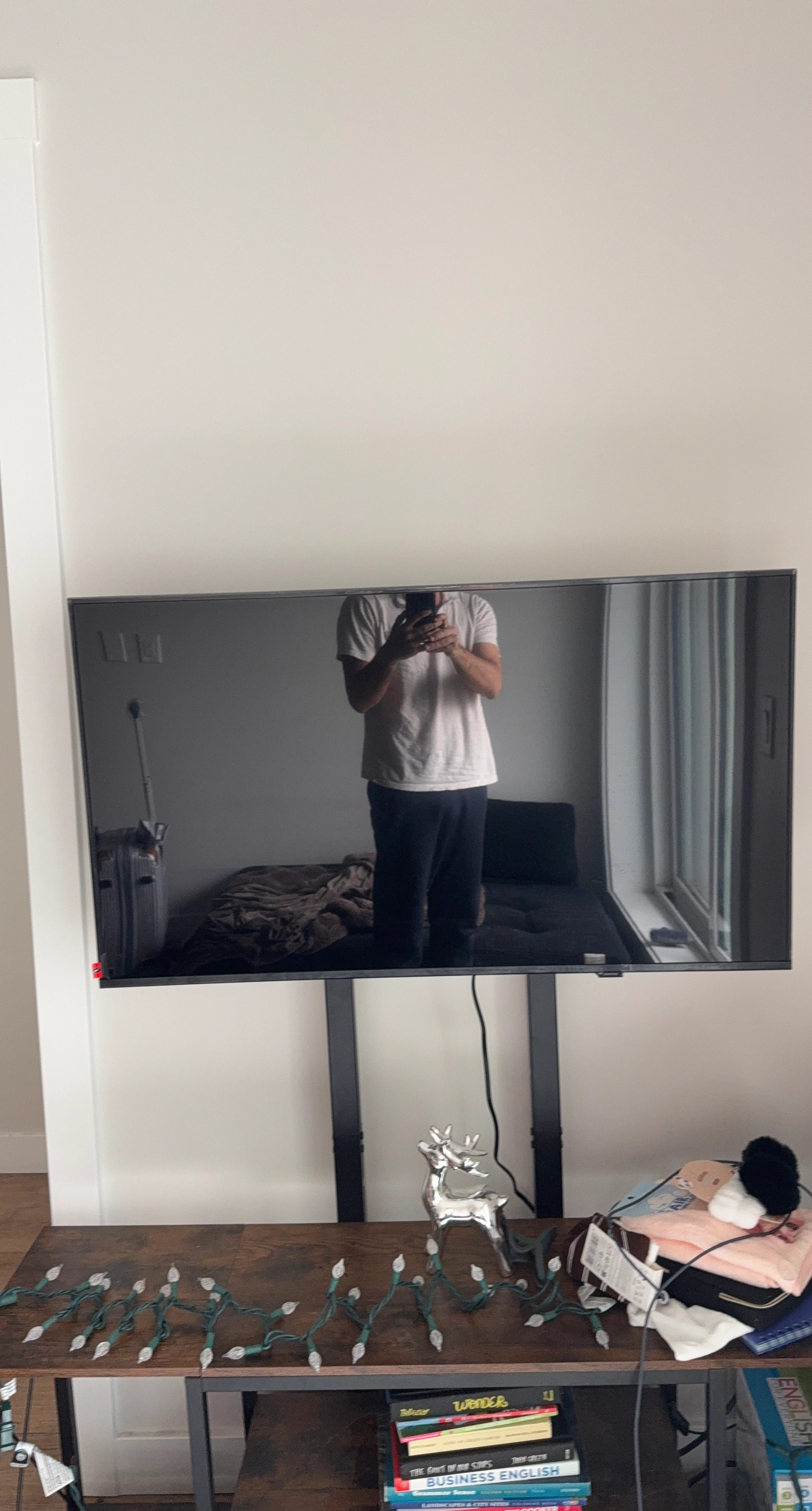 Samsung 55-inch 4K Smart TV + Stand with bookshelf