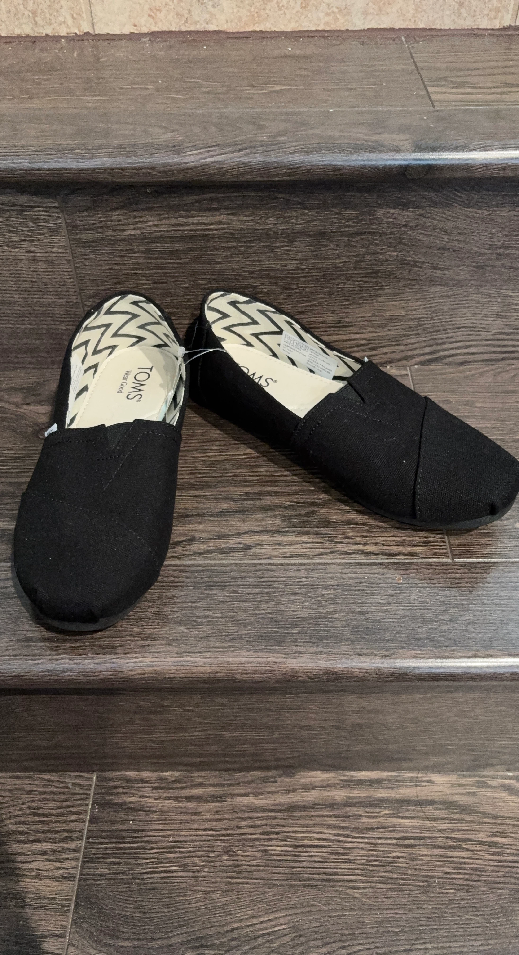TOMS Black Canvas Slip-On Shoes