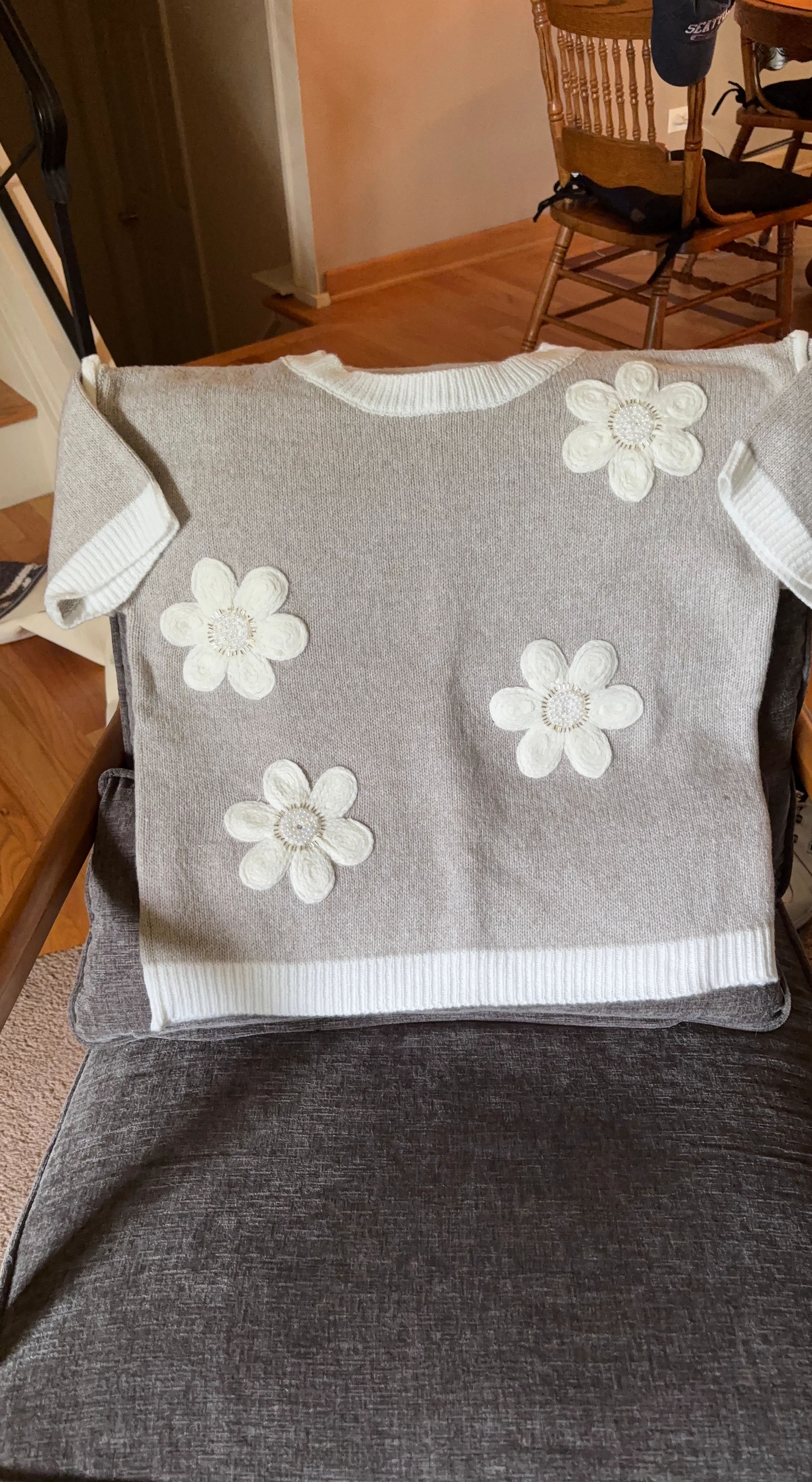 Gray knit sweater with white flower appliques
