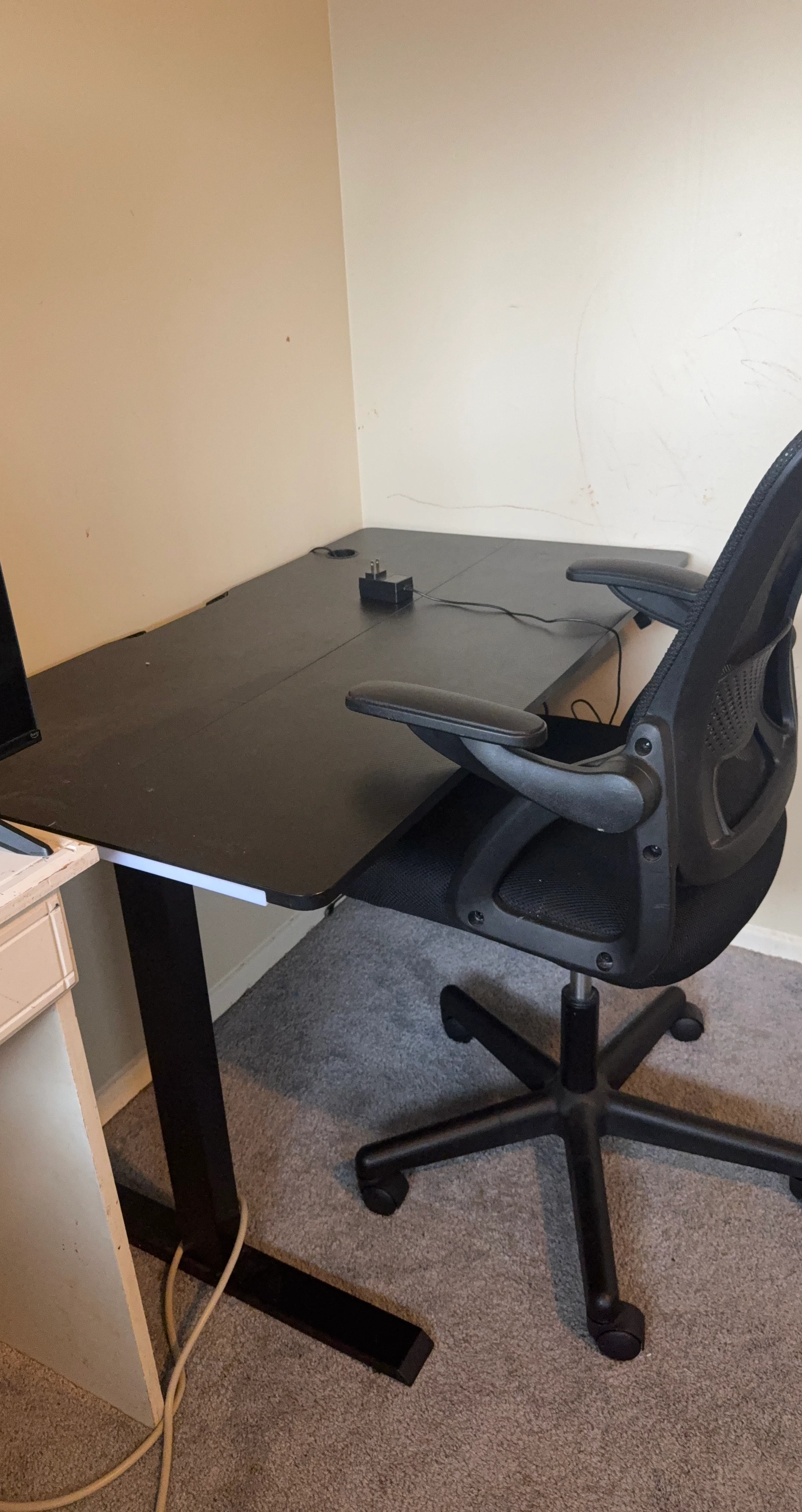 Black Standing Desk with Ergonomic Chair
