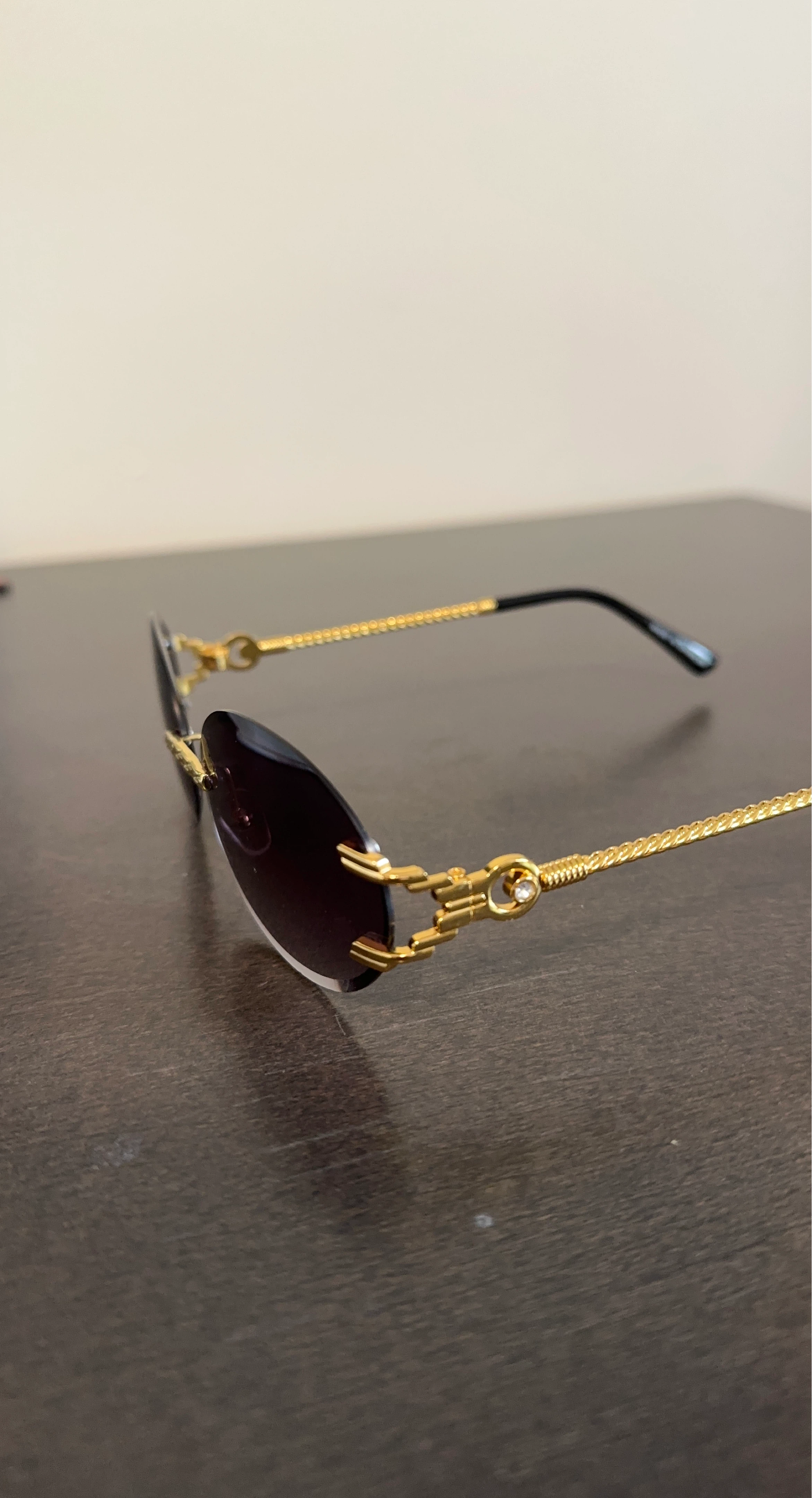 Rimless Oval Sunglasses Gold Chain Arms