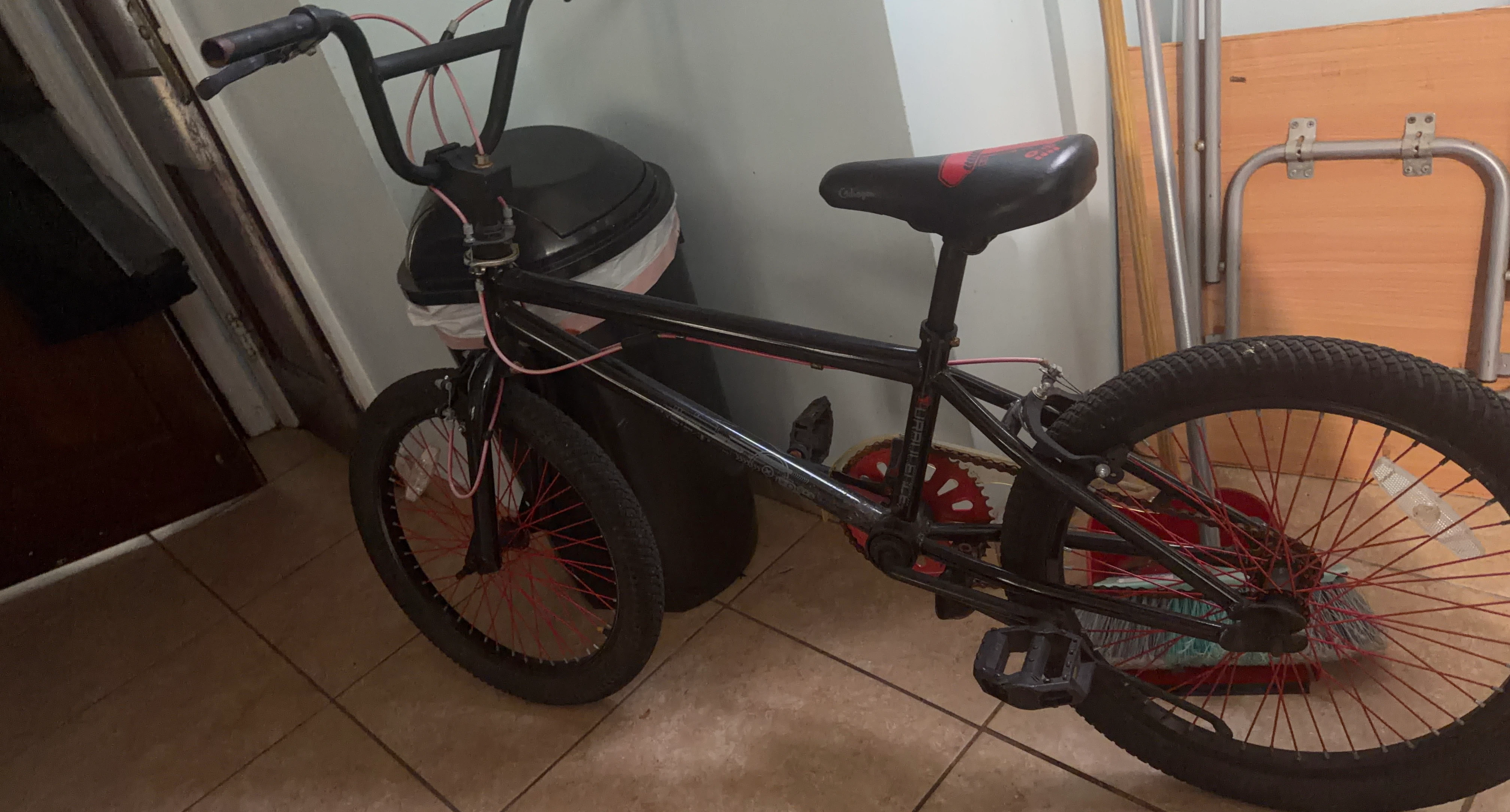 Black BMX Bike with Red Accents
