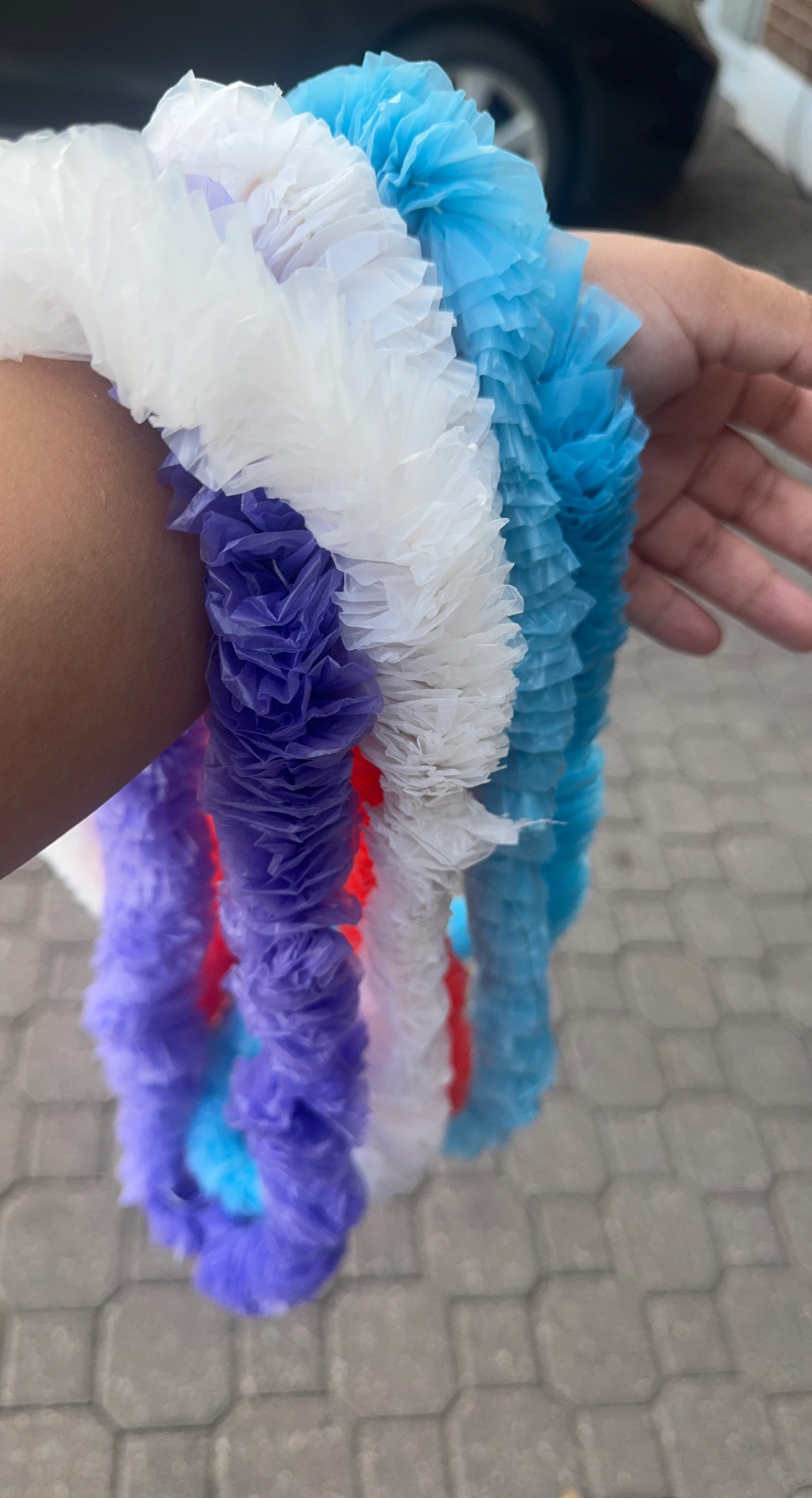Multi-coloured plastic leis