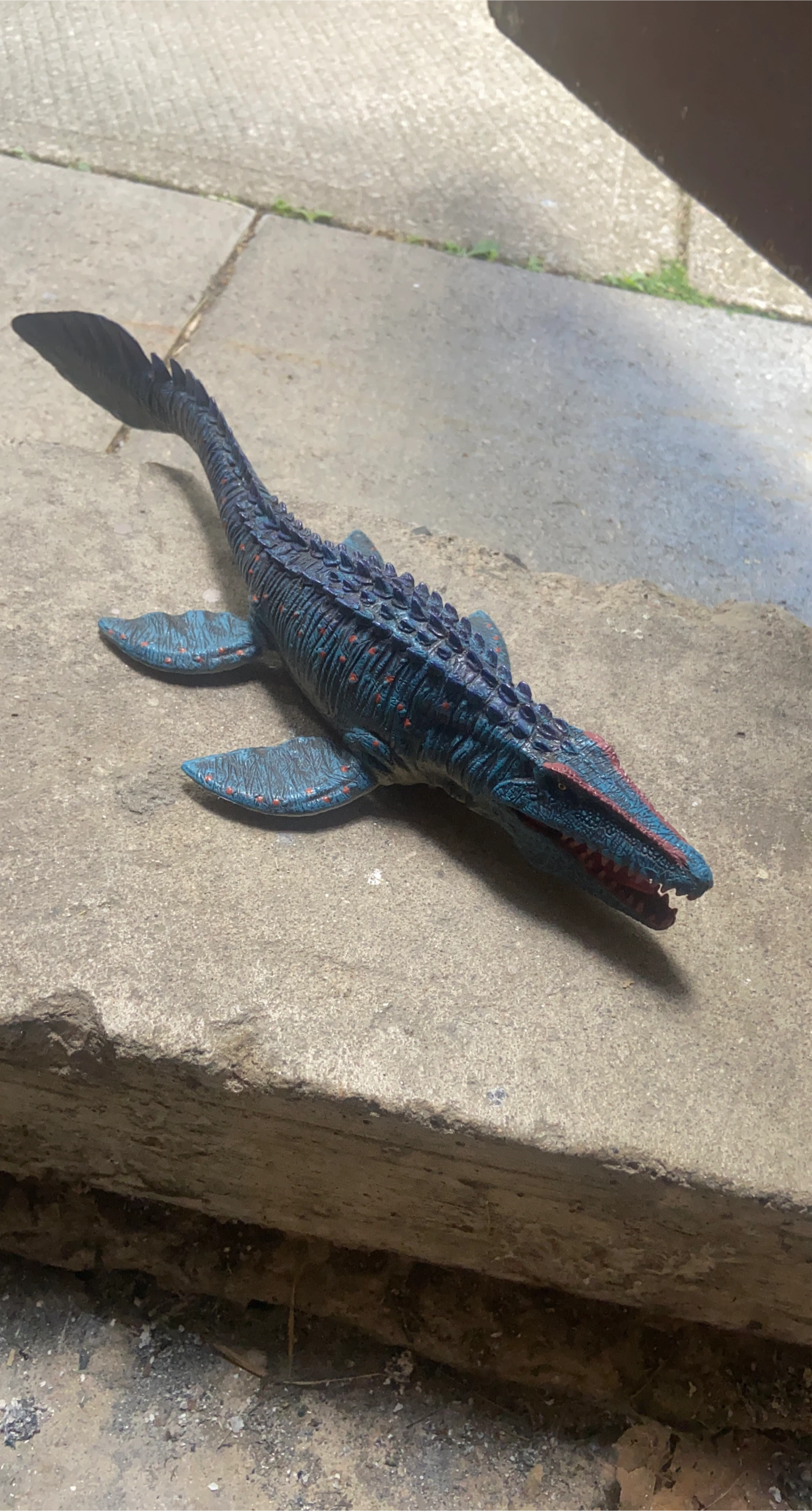 Blue and Red Dinosaur Toy
