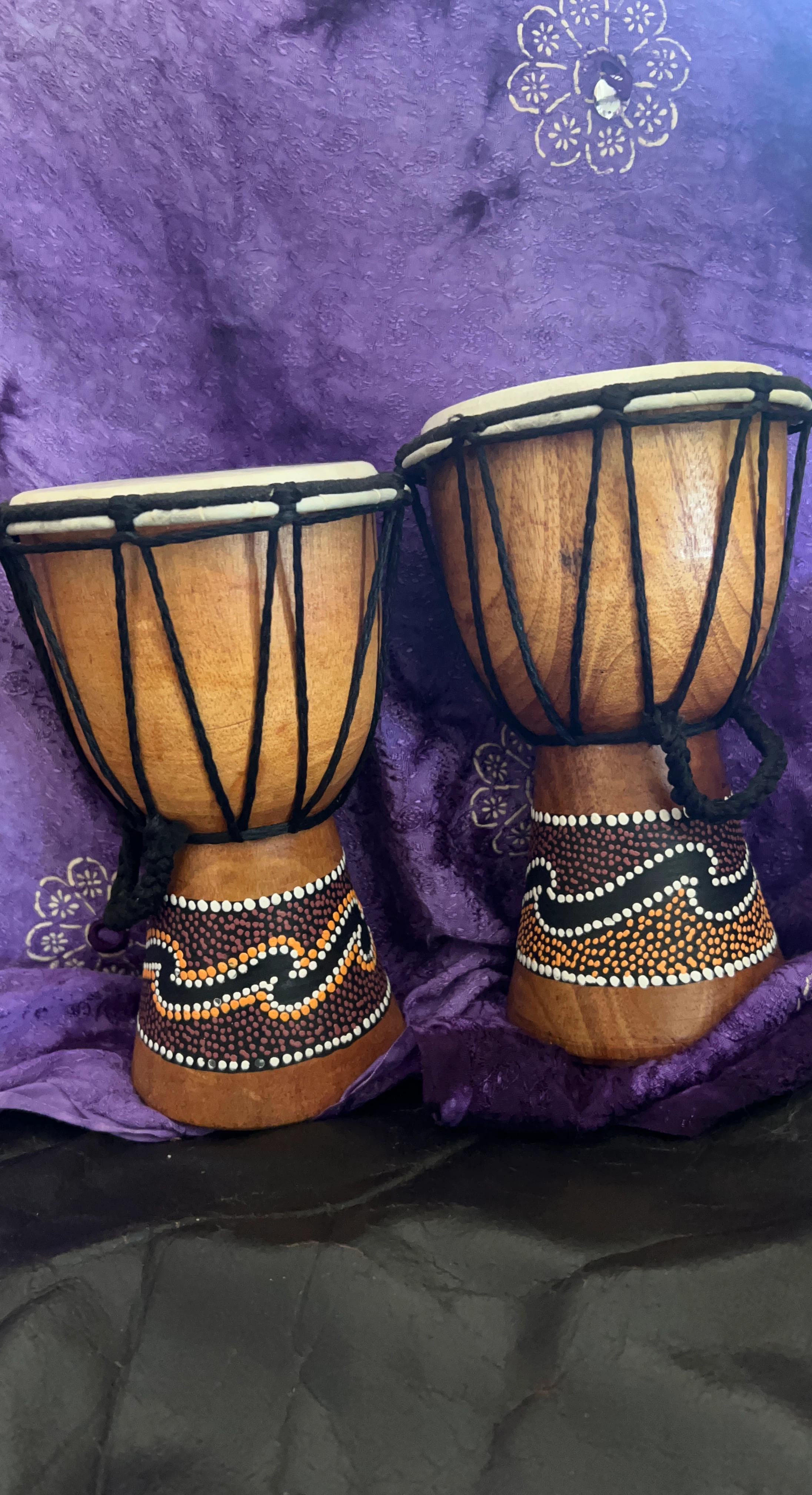 Pair of small wooden djembe drums