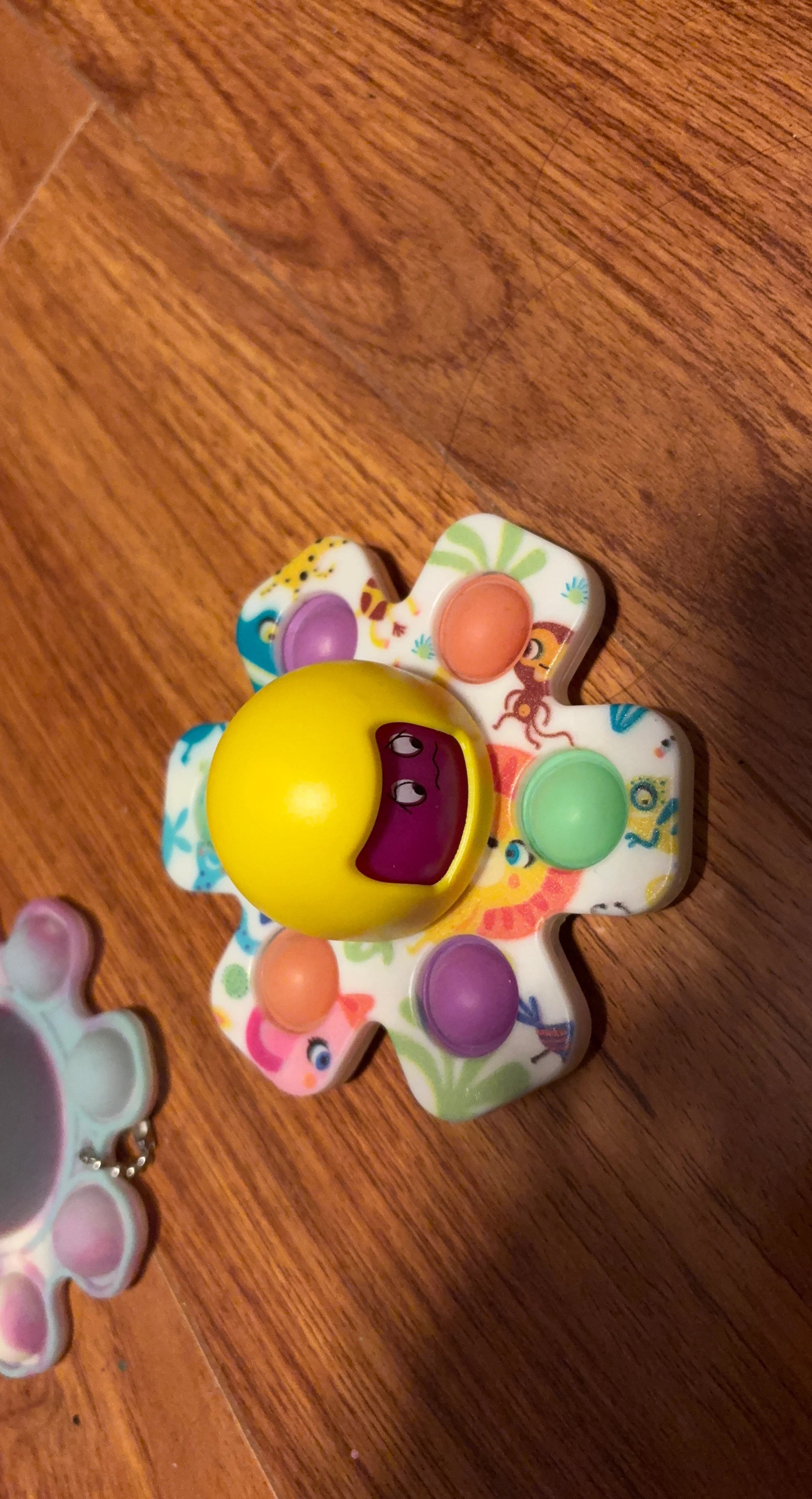 Baby Sensory Toy with Poppers and Spinning Face