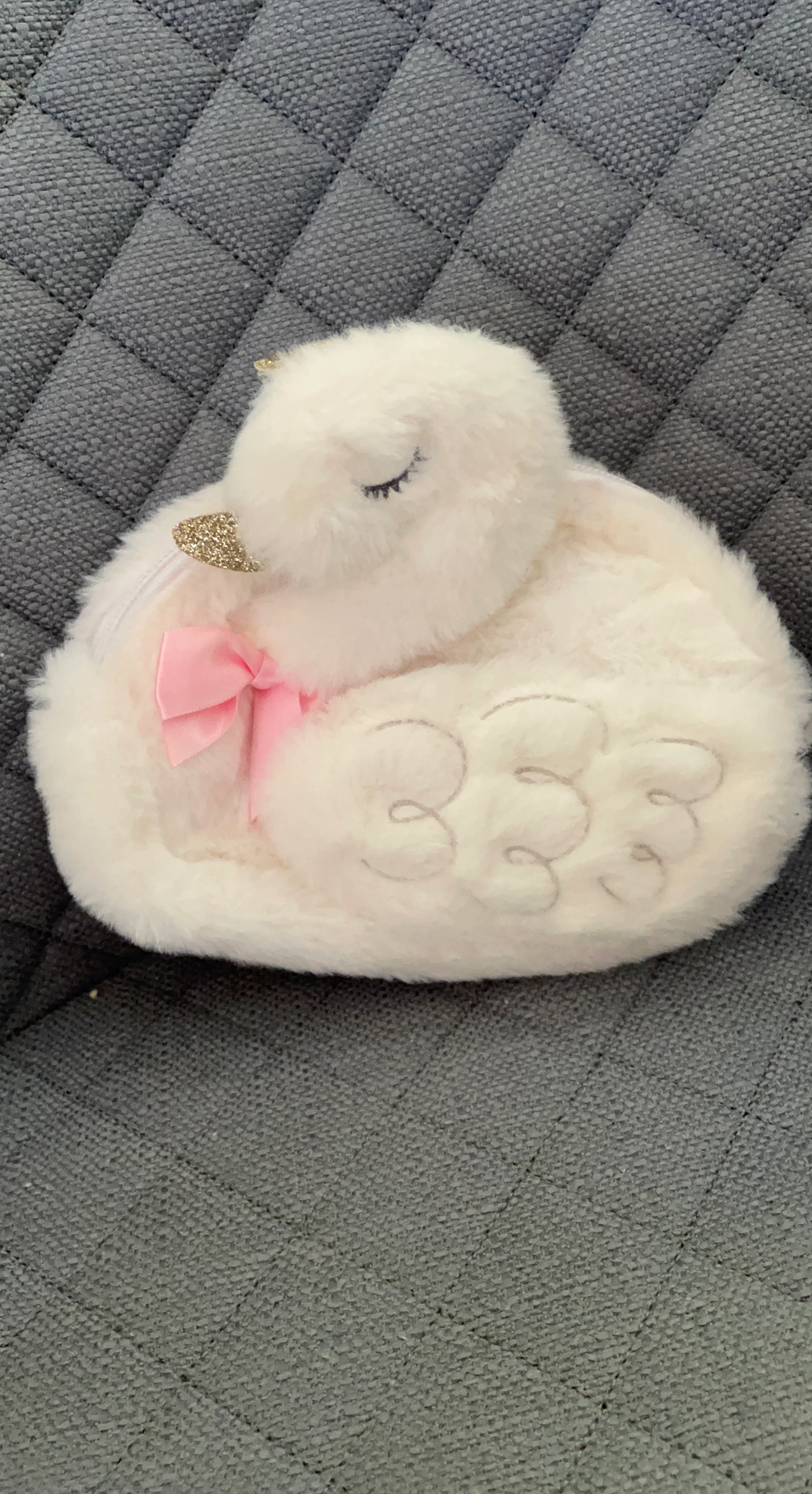 White fuzzy swan cosmetic bag with pink bow