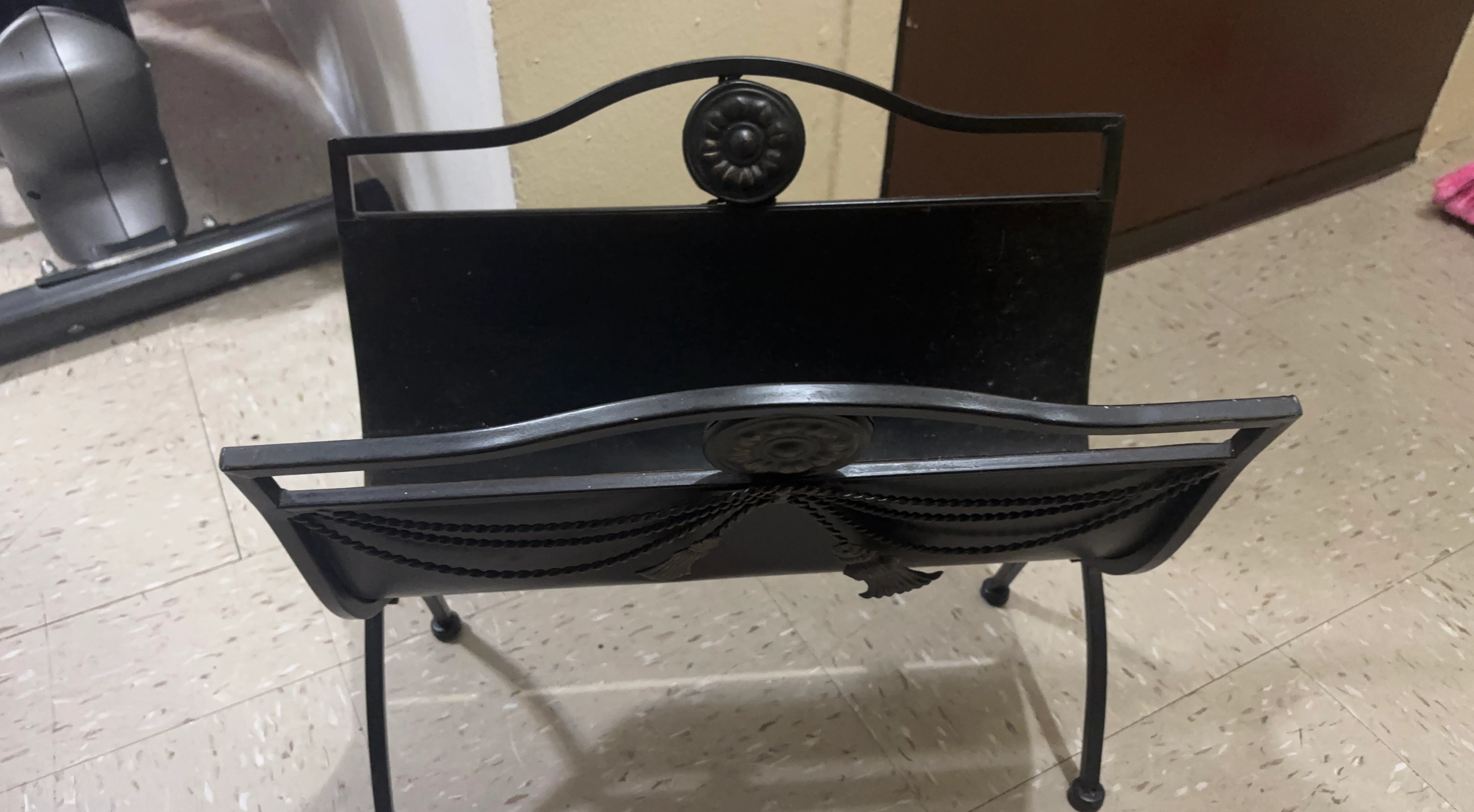 Black Metal Magazine Rack with Ornate Details