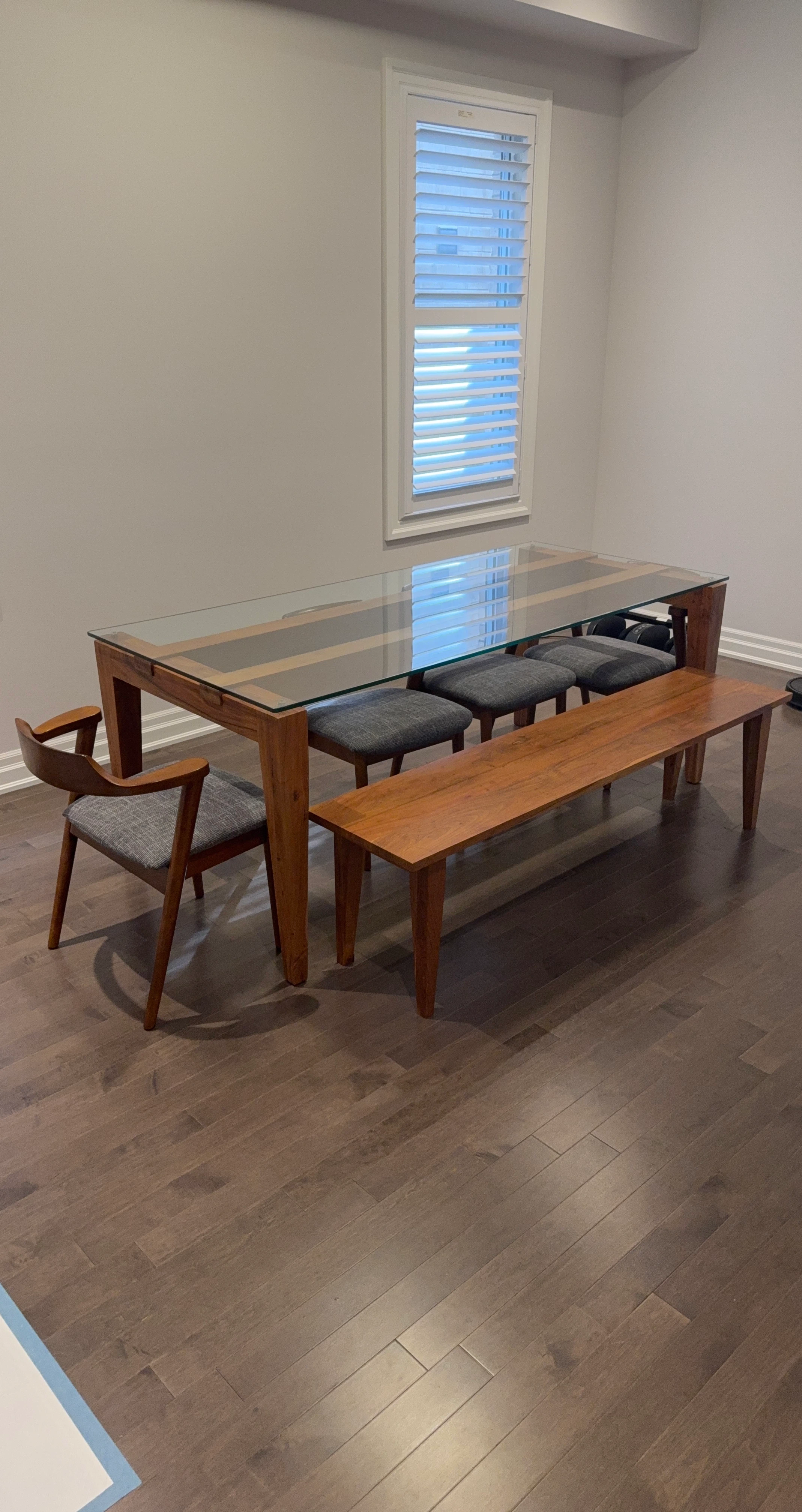Wooden Dining Table with Glass Top and Upholstered Chairs