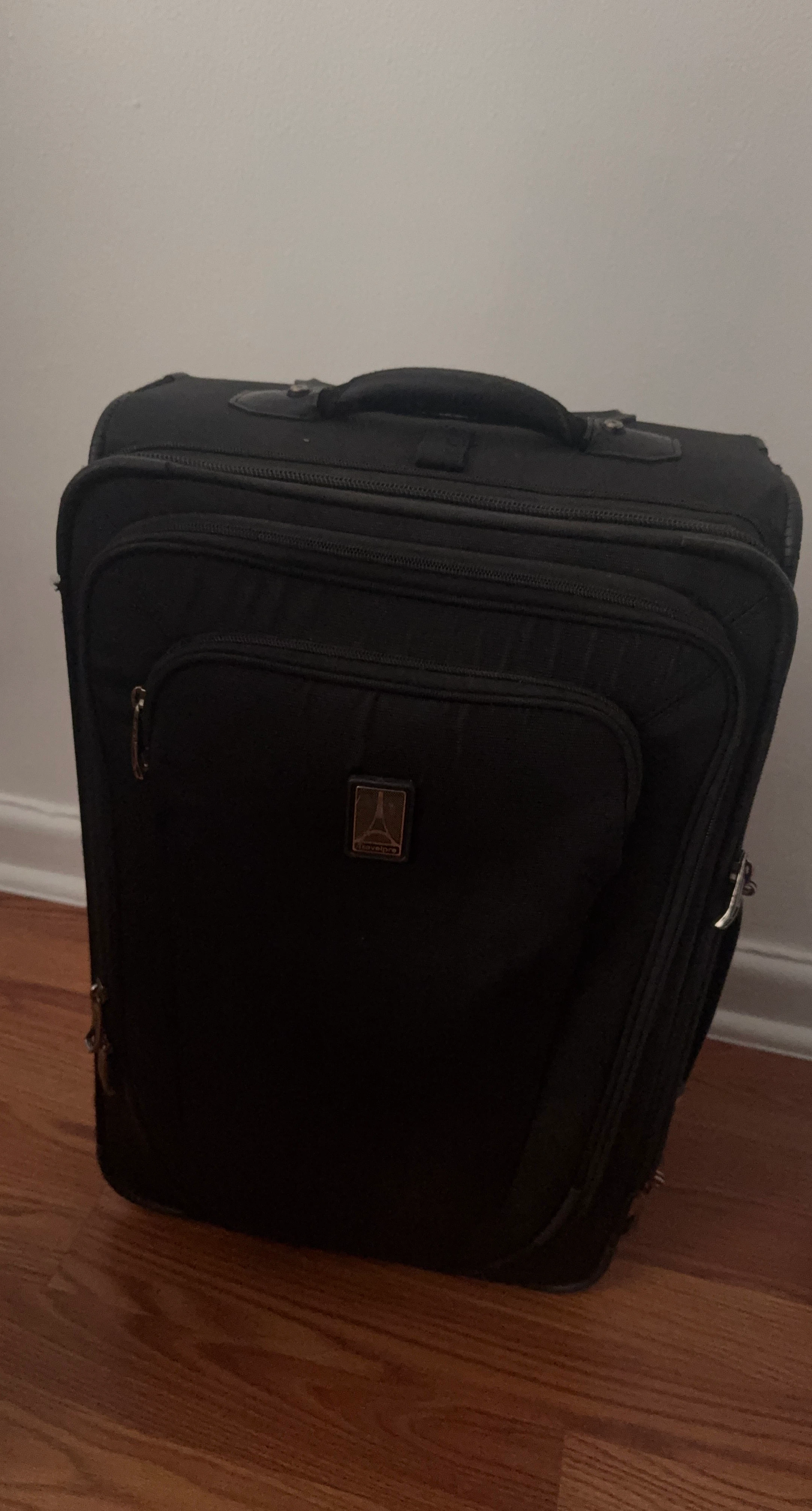Travelpro Black Rolling Suitcase