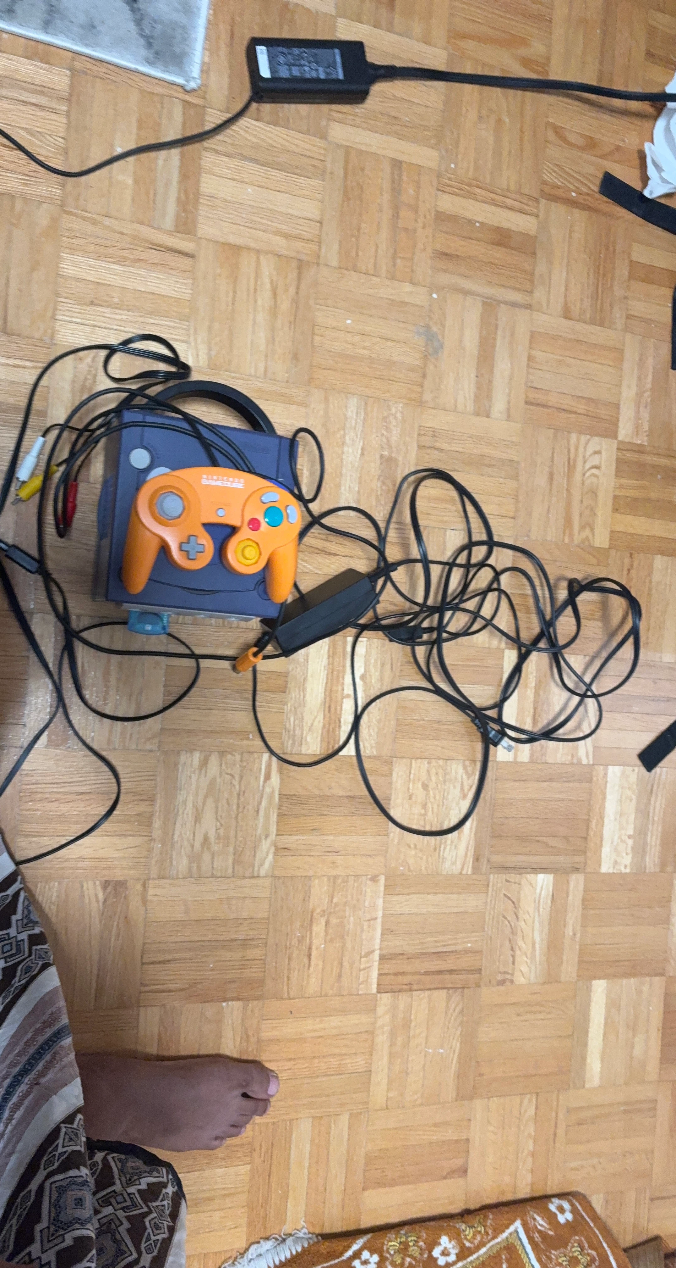 Nintendo GameCube Console with Orange Controller and Accessories