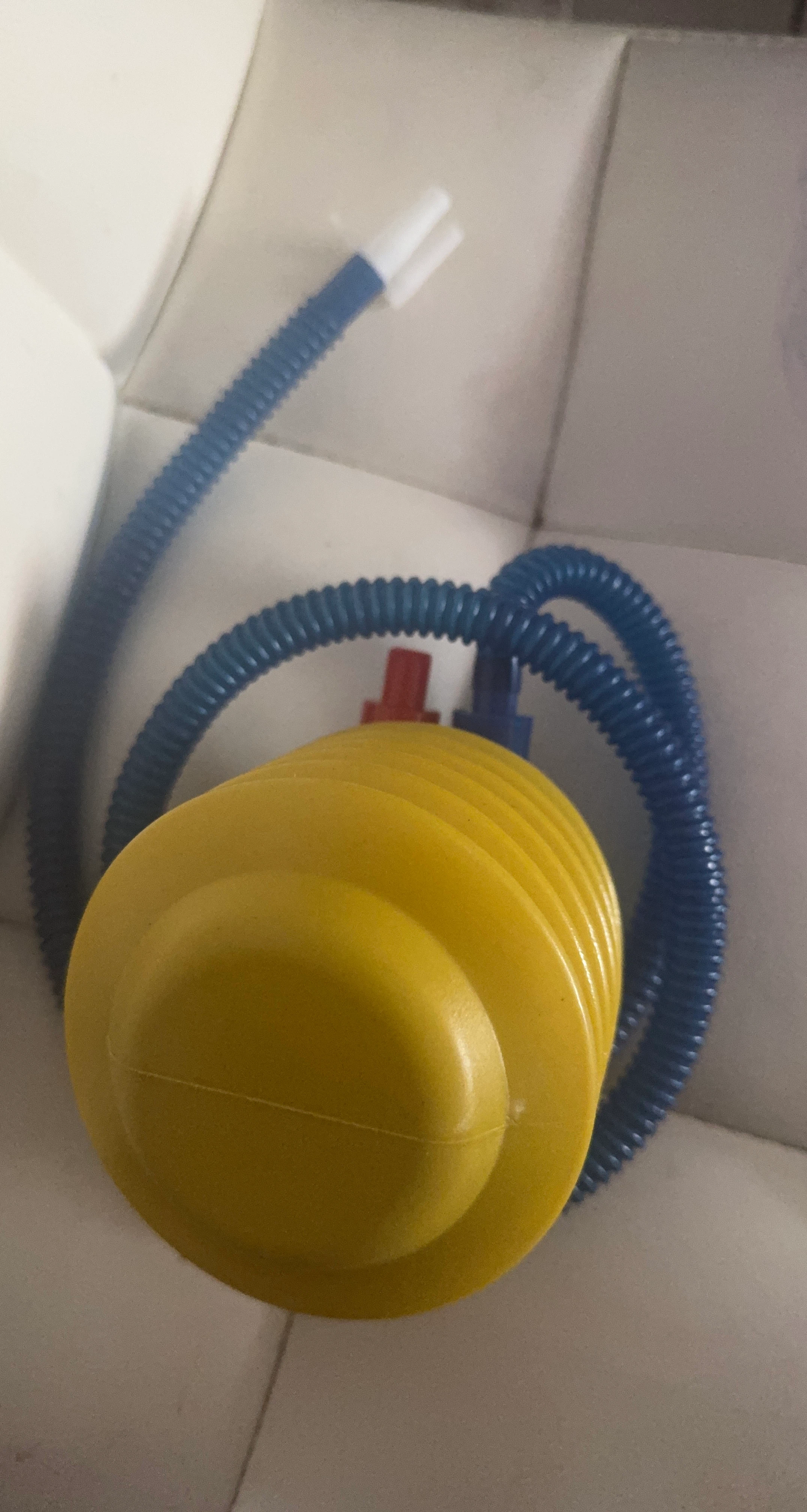 Yellow Accordion Hand Pump with Blue Hose