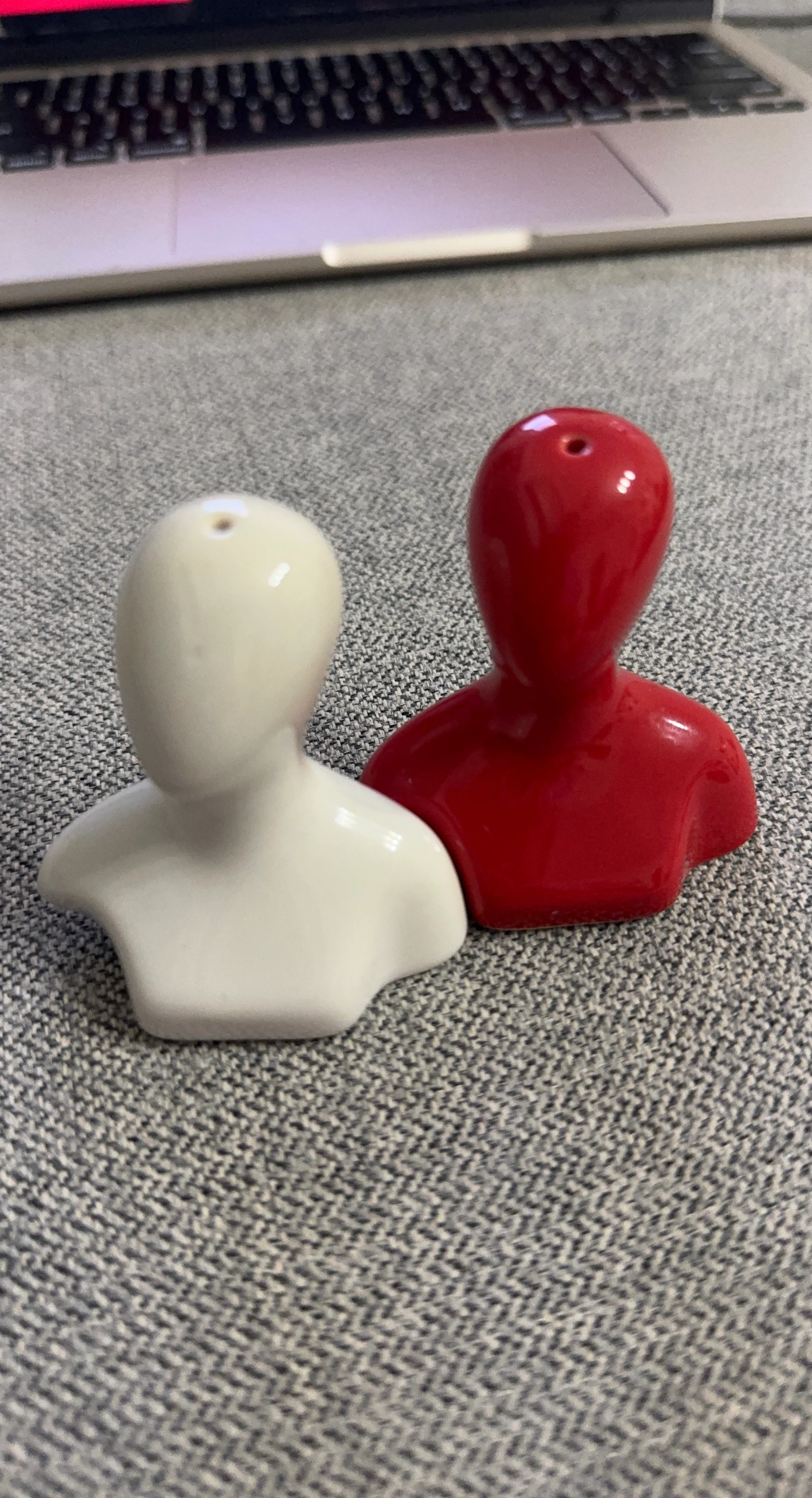 Red and White Ceramic Man Shaker Set