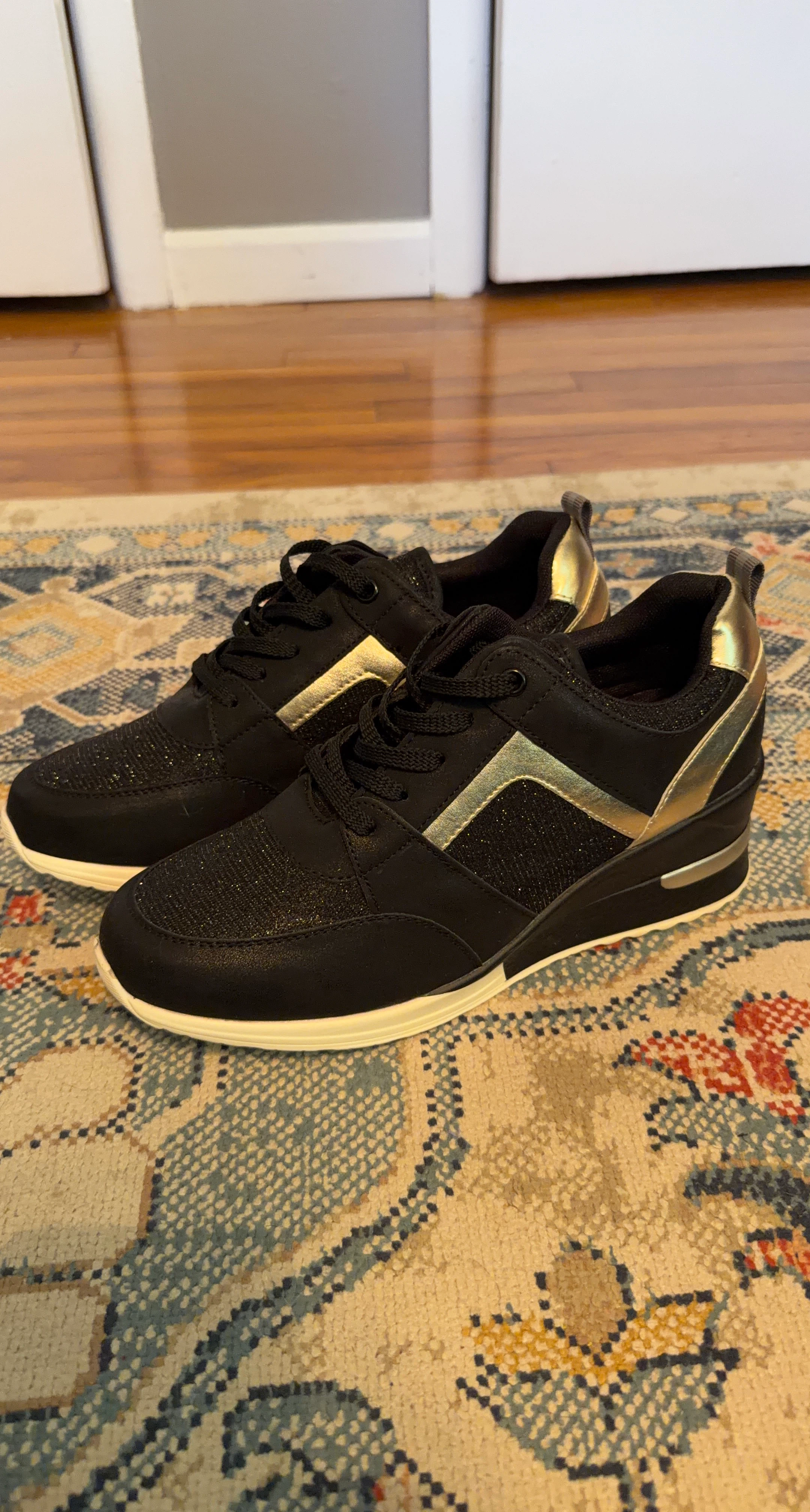 Black Wedge Sneakers with Gold Accents