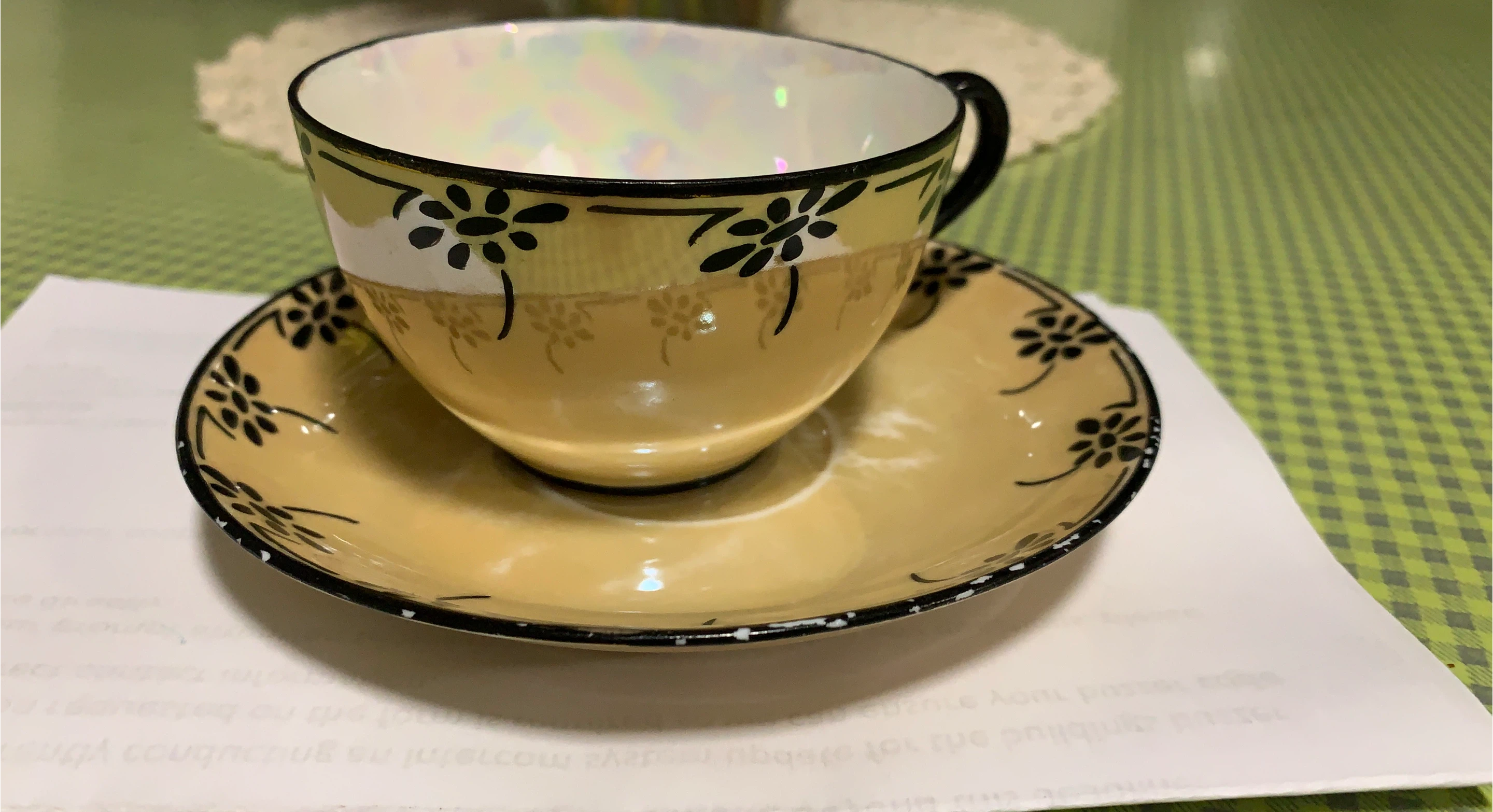 Yellow floral teacup and saucer