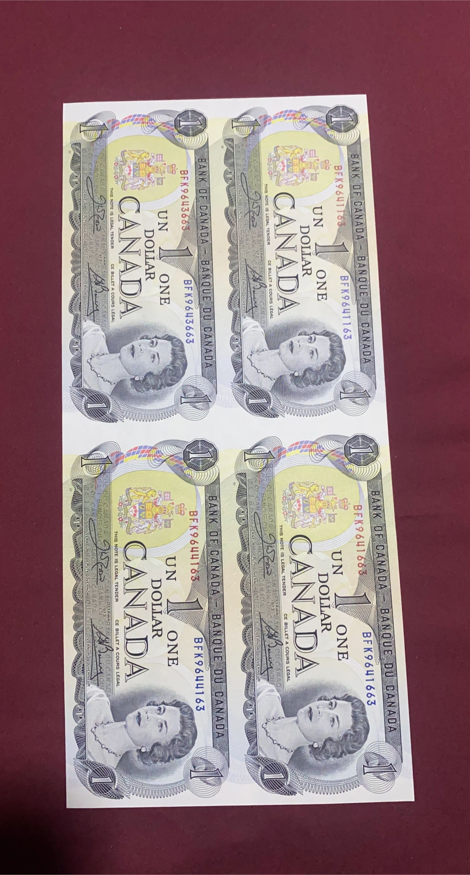 Four Uncirculated Canadian One Dollar Bills