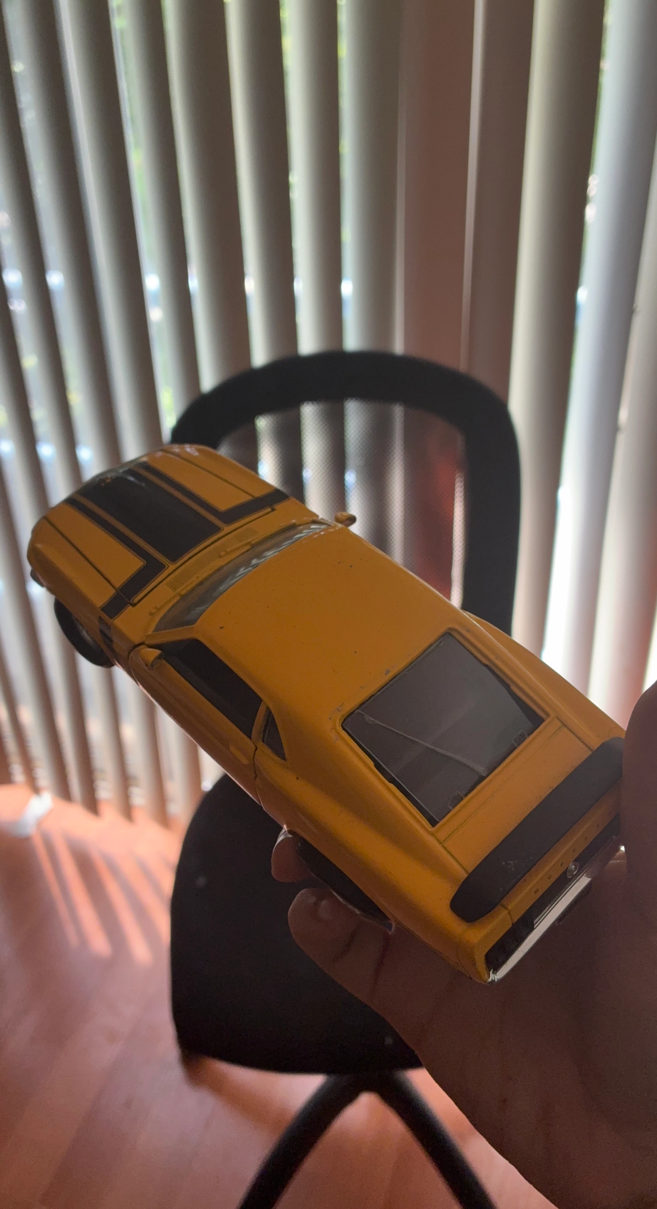 Yellow Toy Car with Black Stripes