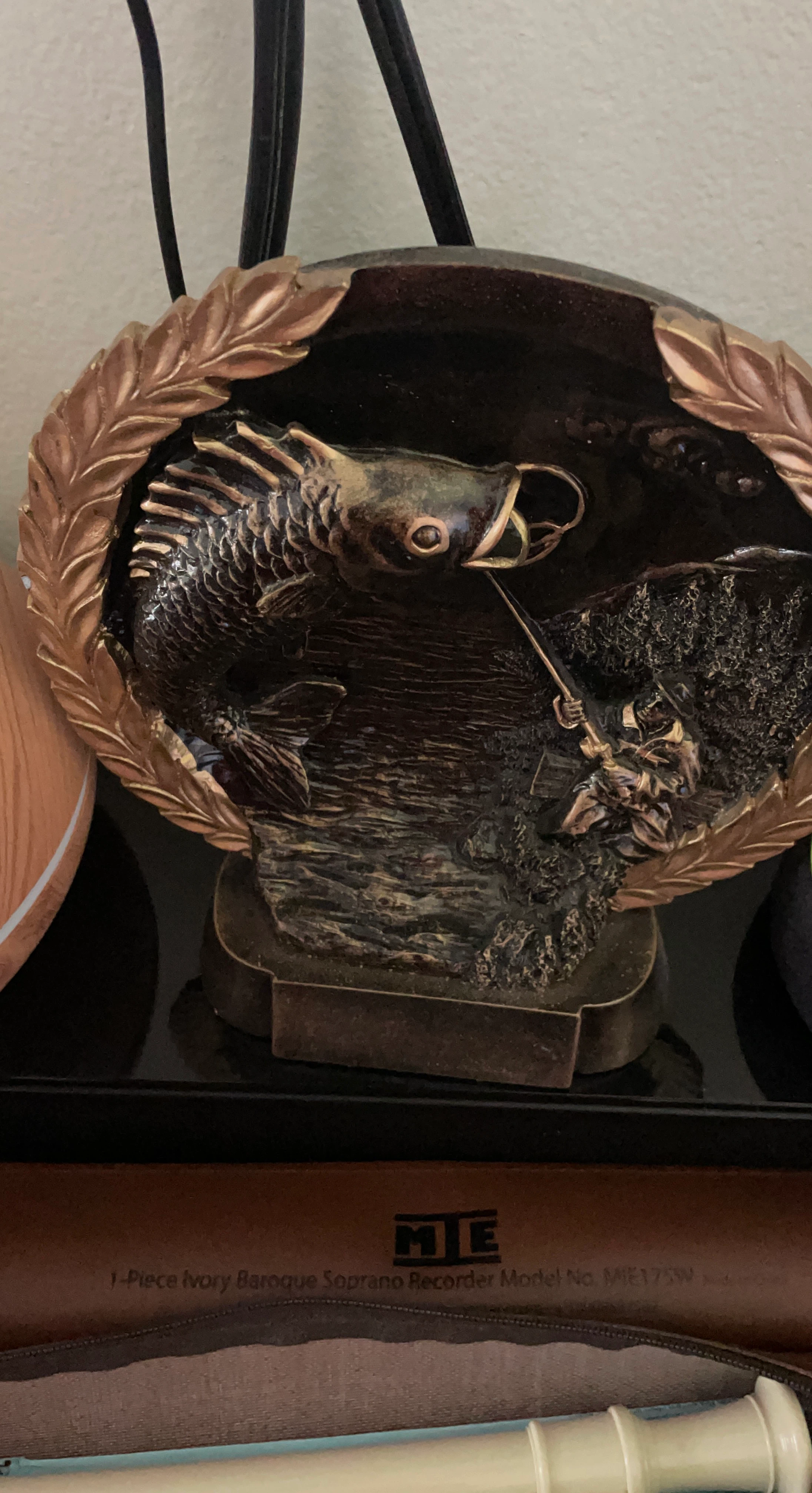 Fishing Trophy with Large Fish and Angler
