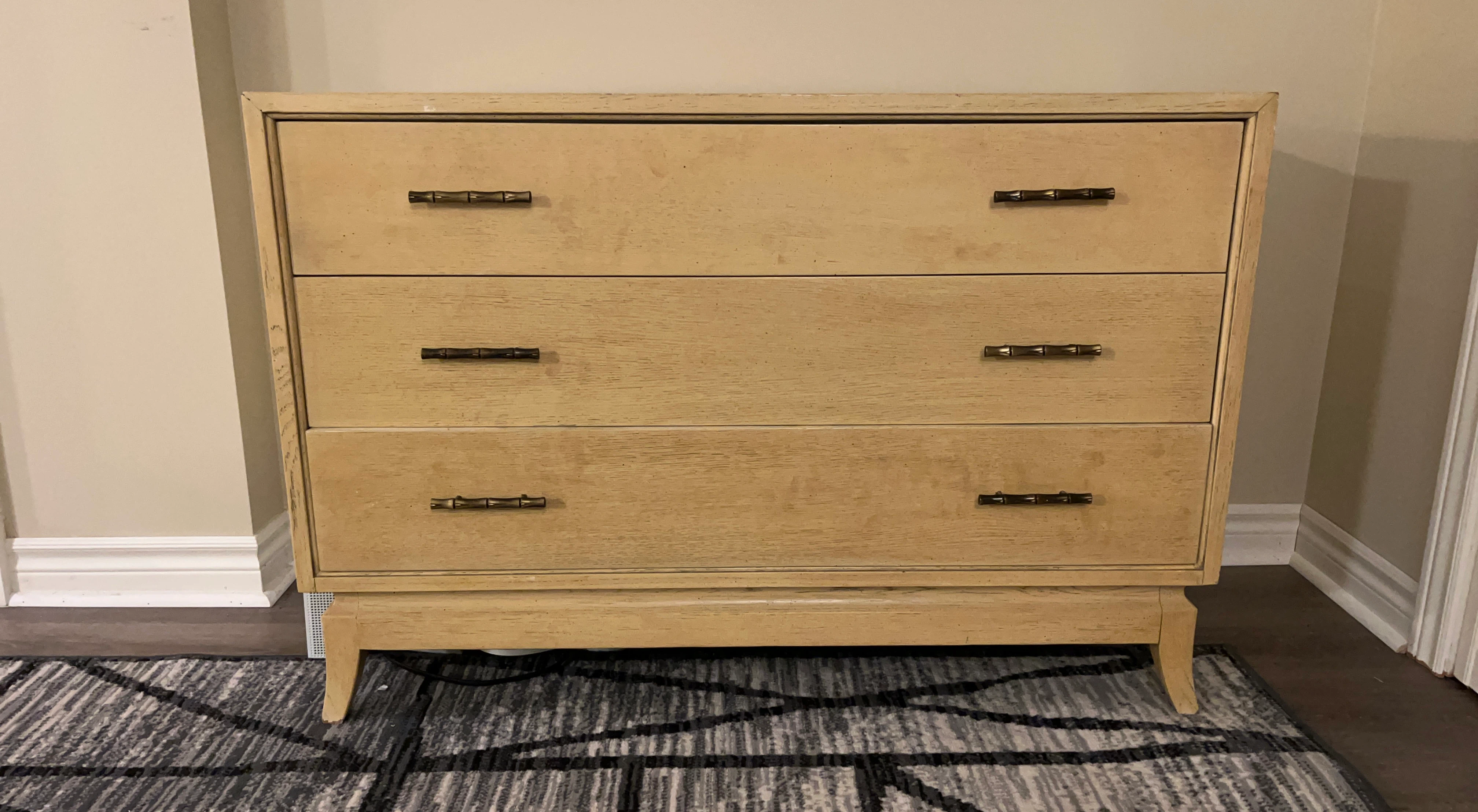 Three-drawer dresser with bamboo-style hardware