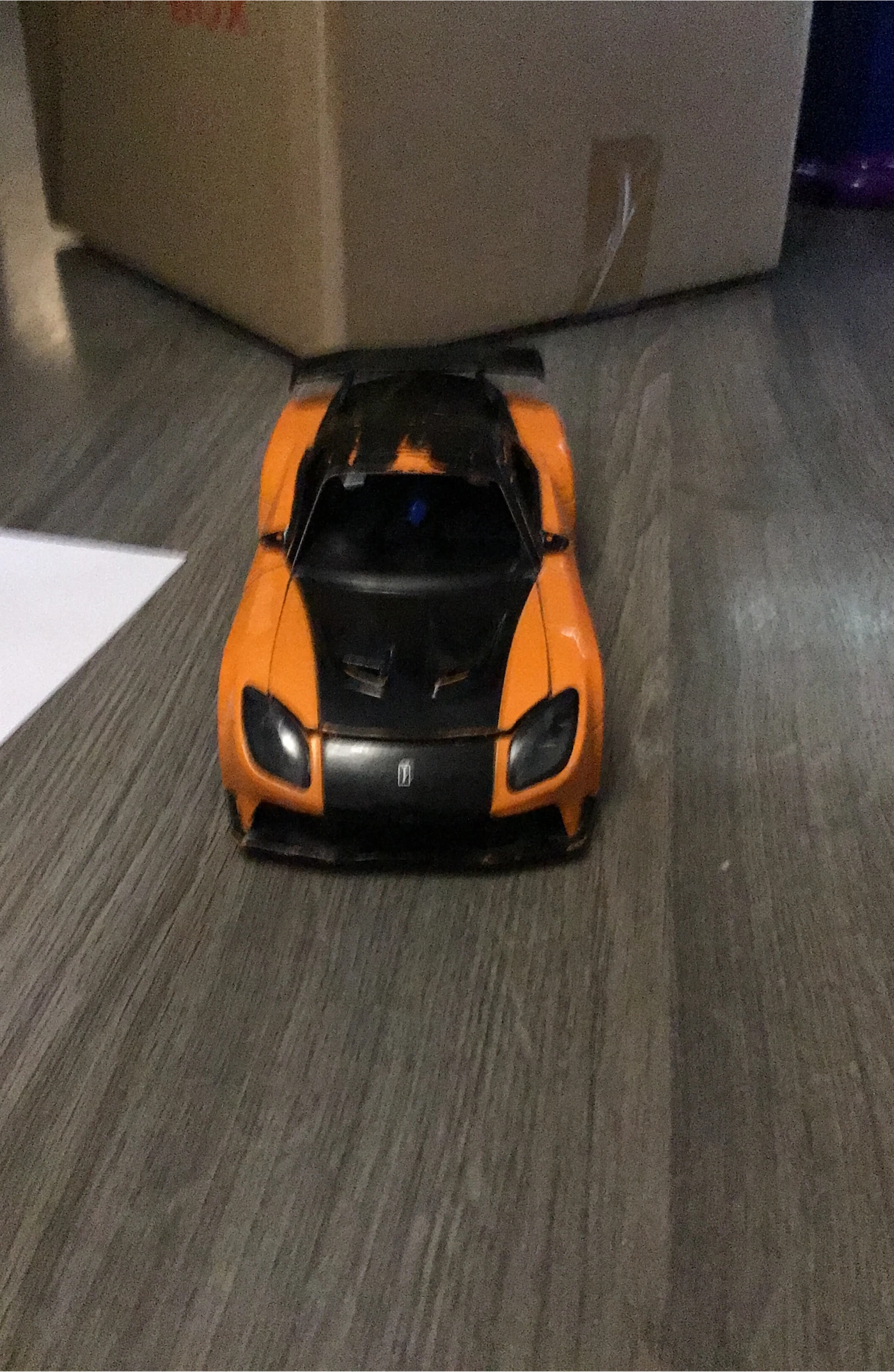 Orange and Black sports car (Jada toy car