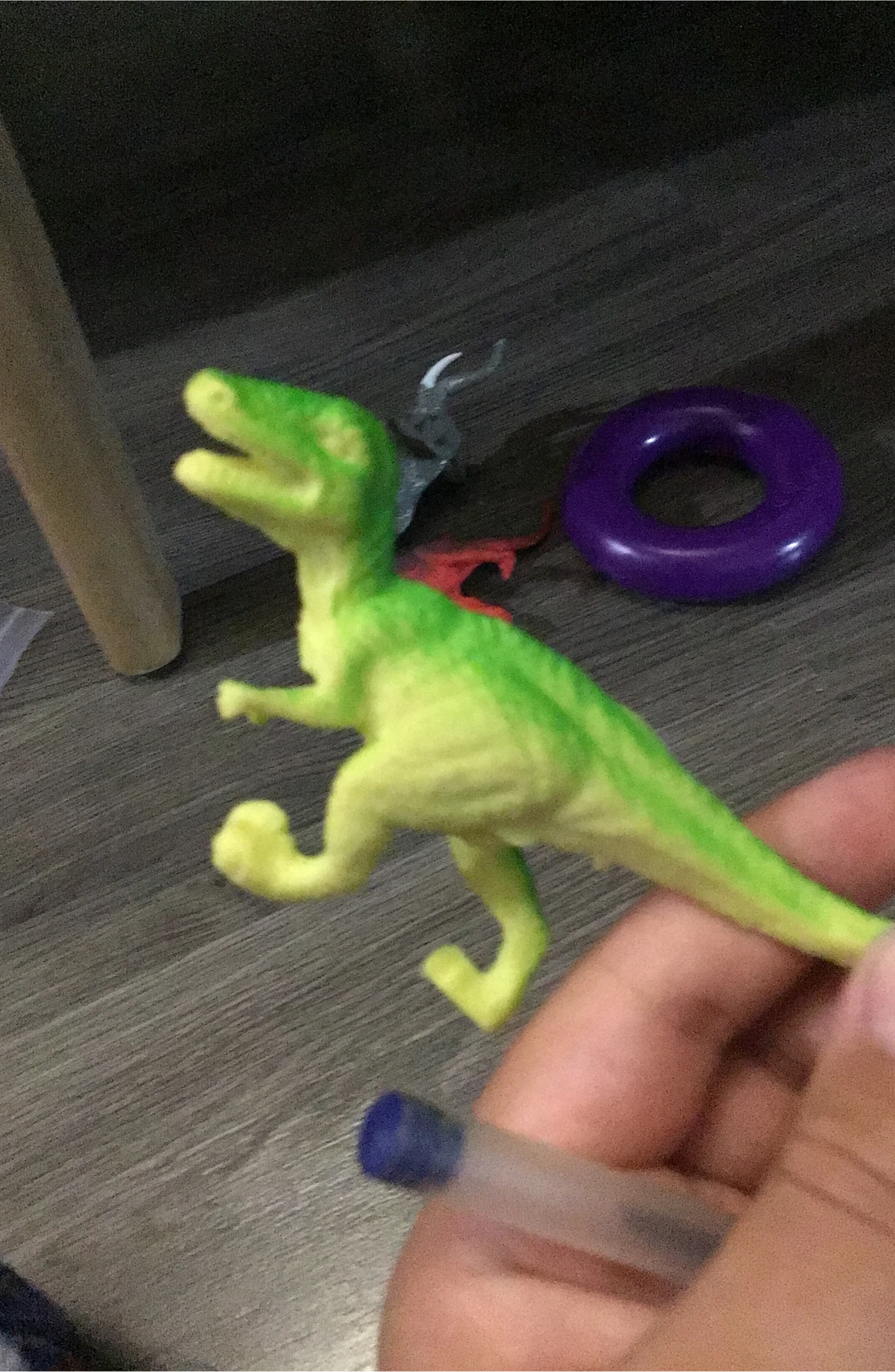 Green and Yellow Dinosaur Toy