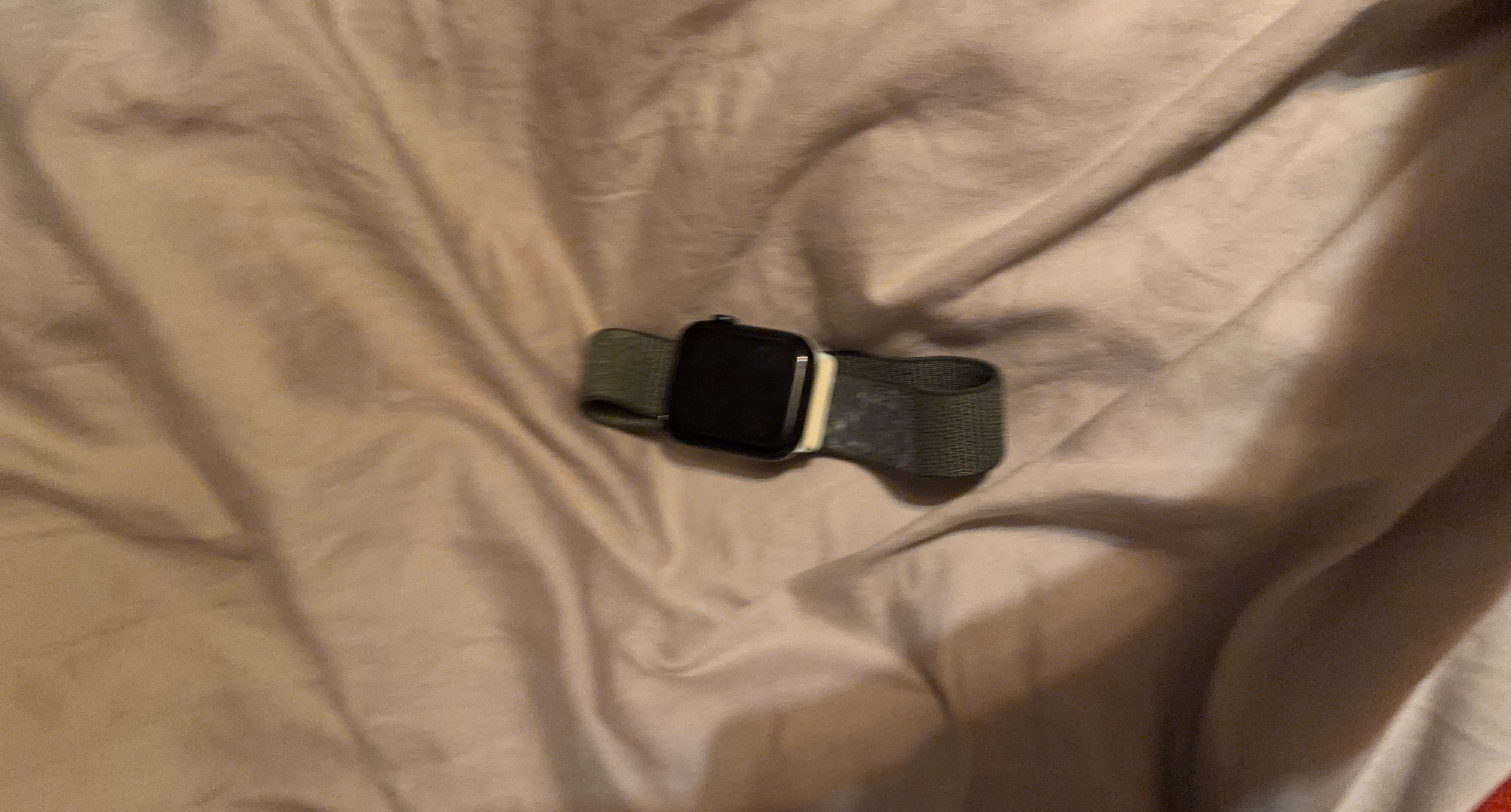 Apple Watch SE 44MM, with green braided band