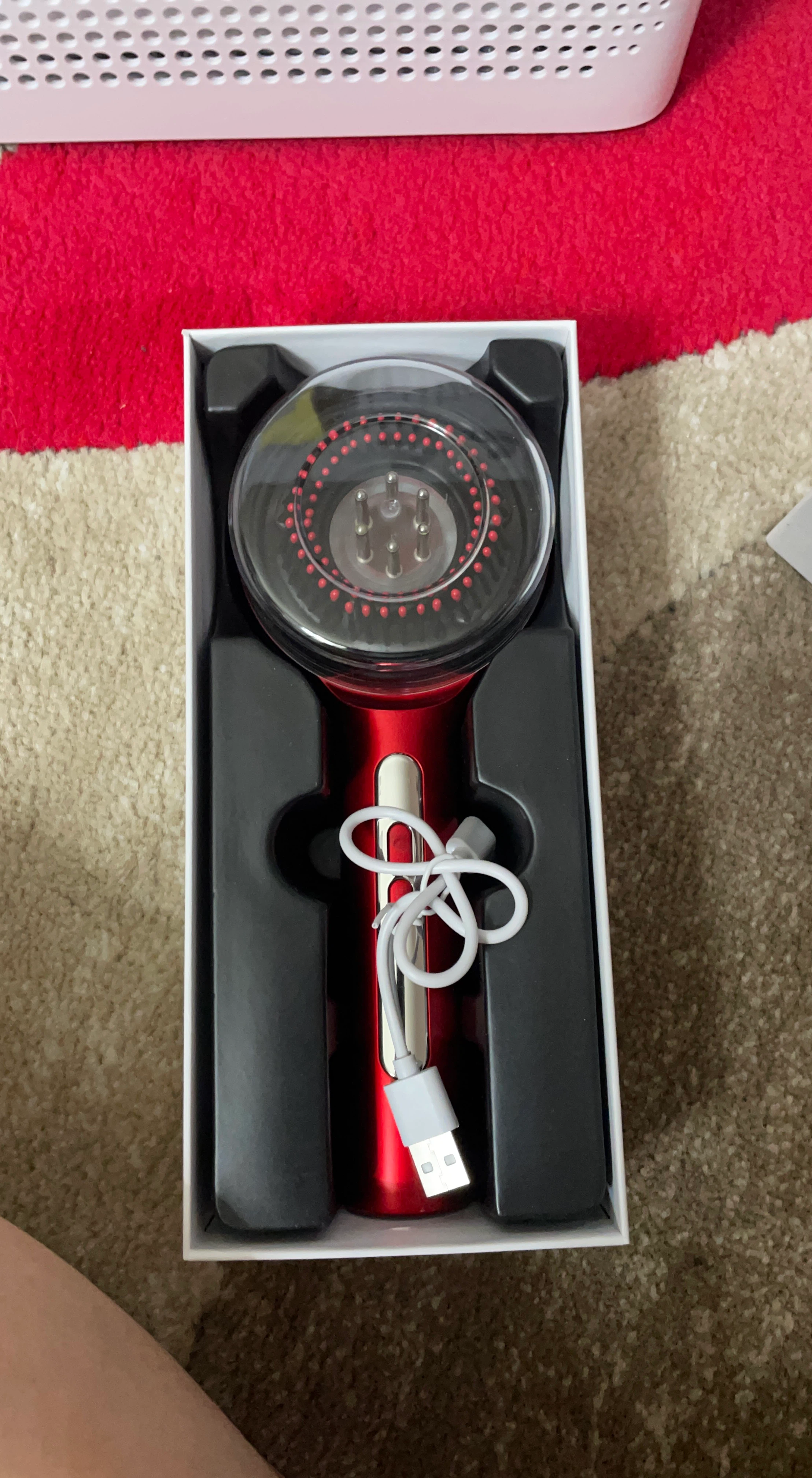 Red Facial Device with USB Cable
