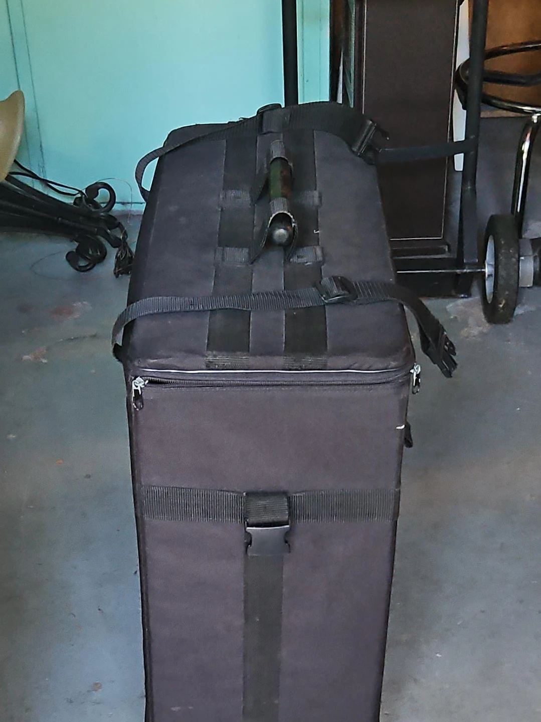 Black rolling travel case