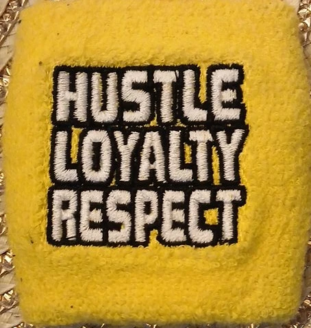 Authentic wwe Yellow Wristband HUSTLE LOYALTY RESPECT