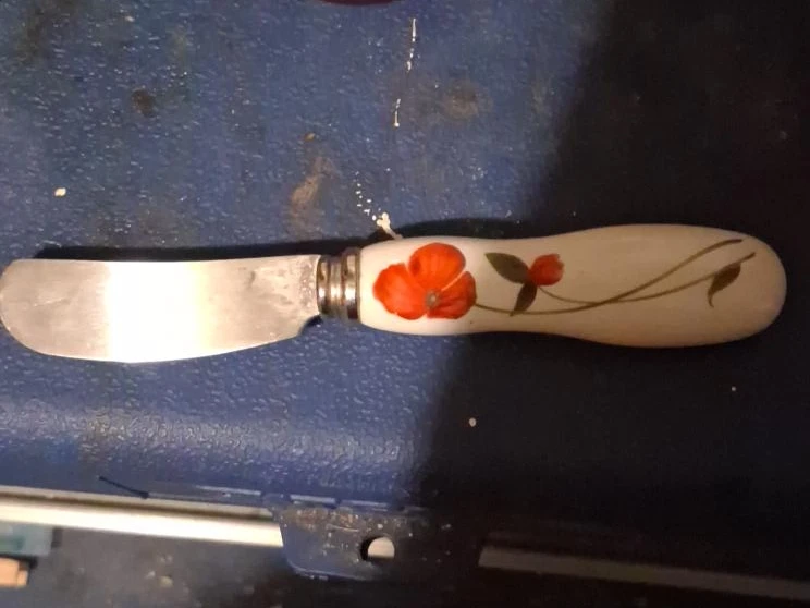 Butter knife with hand-painted floral design