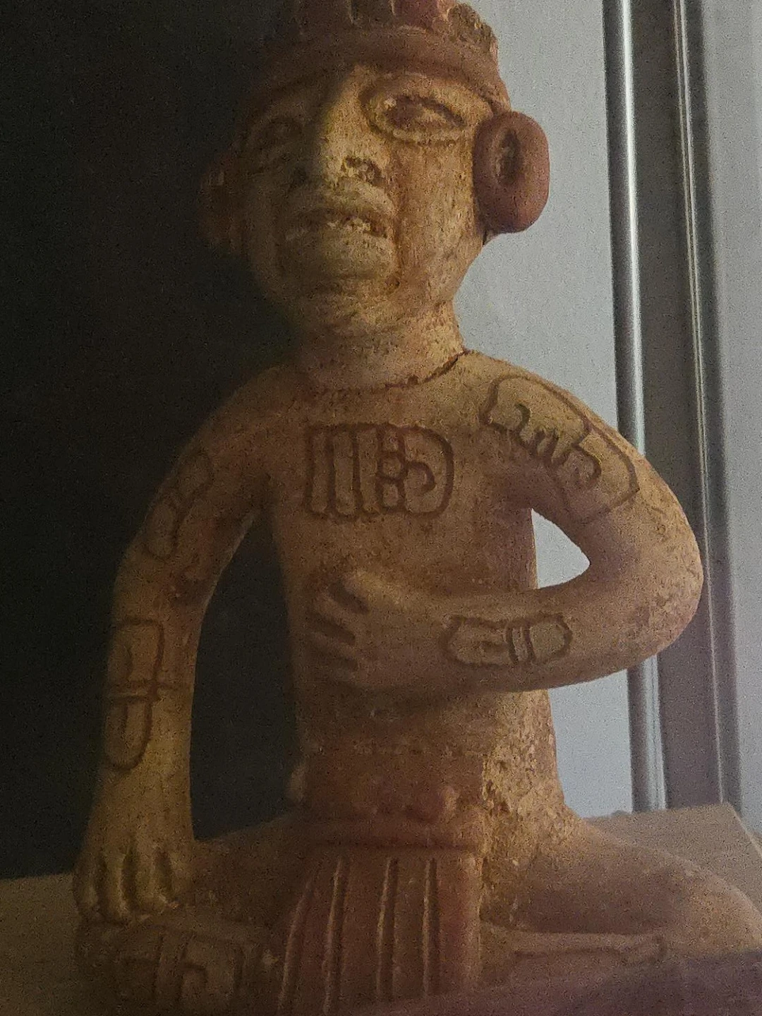 Terracotta Figurine with Carvings