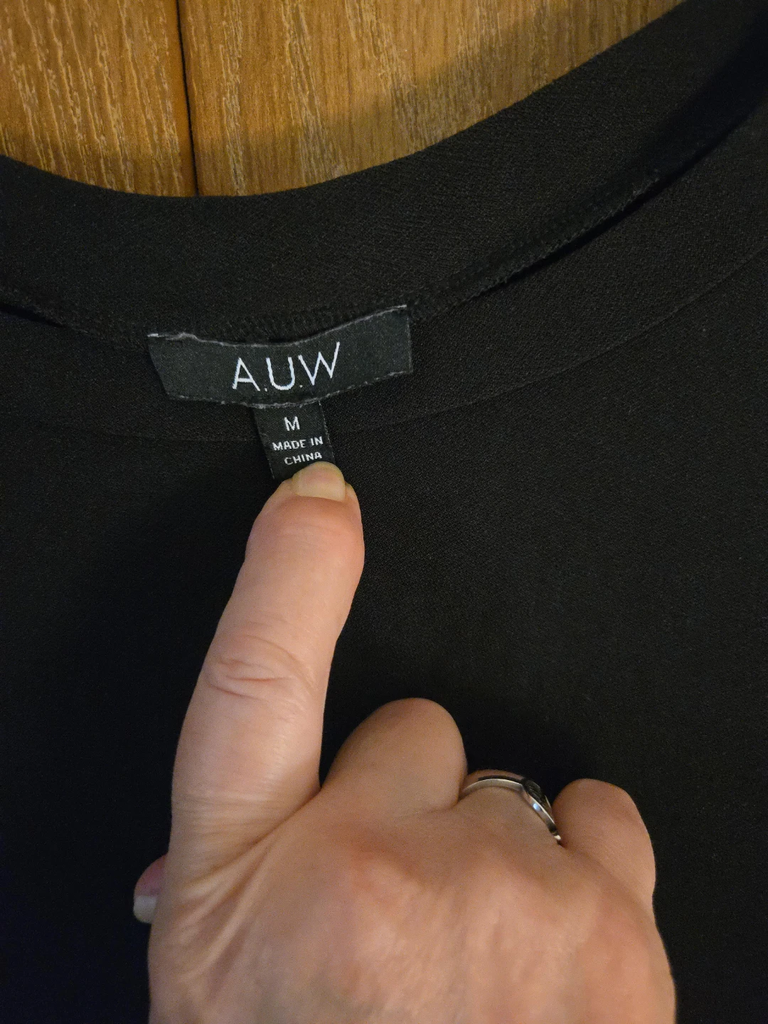 A.UW Black & Leopard Print Tunic Top