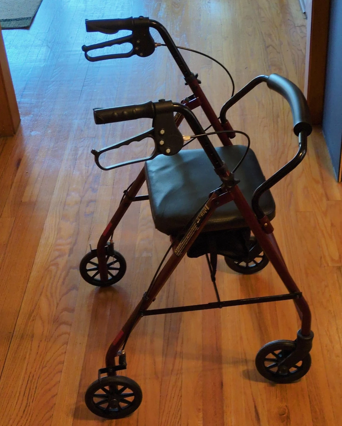Red Folding Walker with Seat