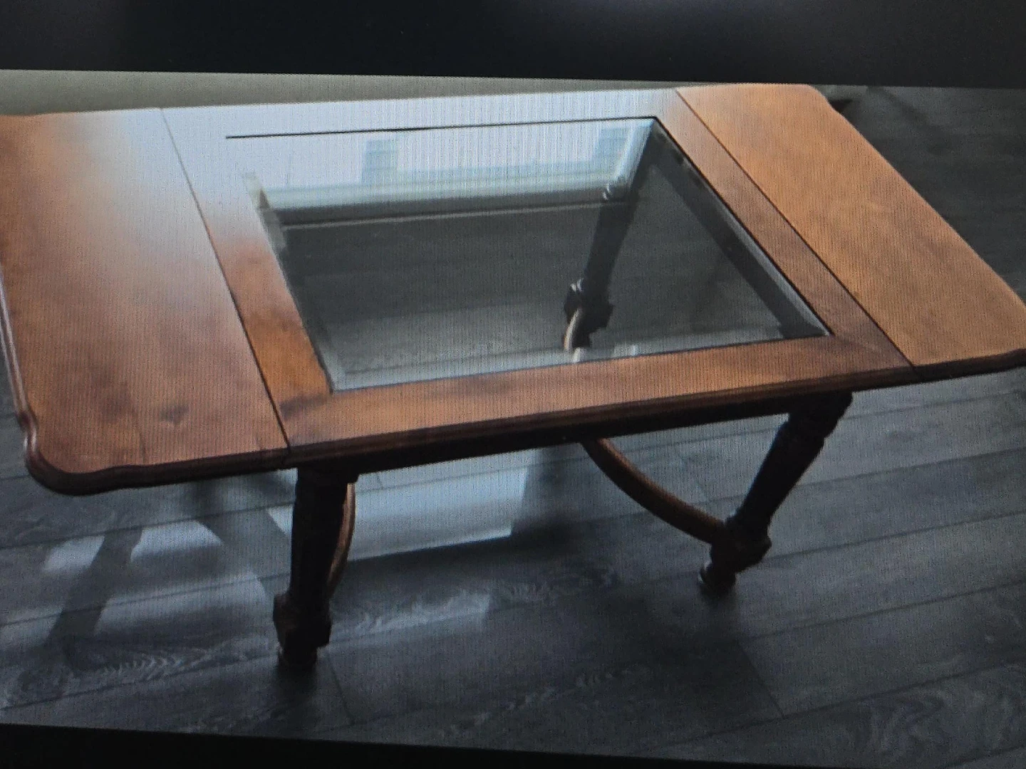 Wooden coffee table with glass insert