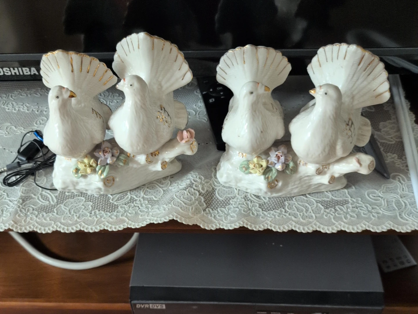 White porcelain doves figurine with gold trim