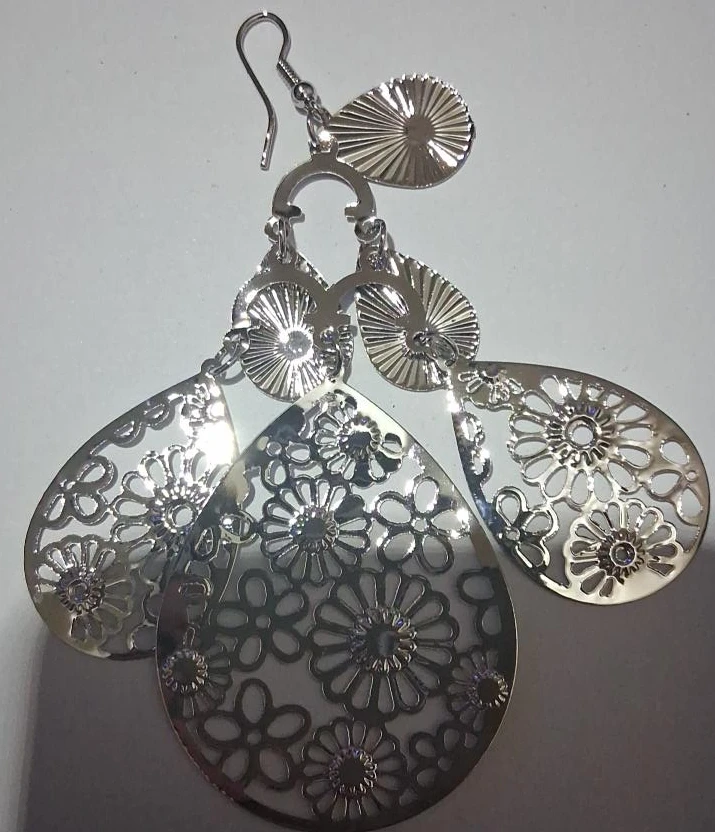 Silver teardrop dangle earrings with floral cutouts