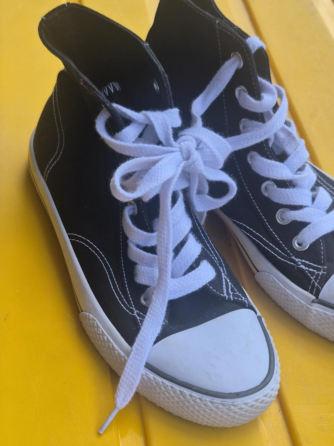 Black high-top canvas sneakers