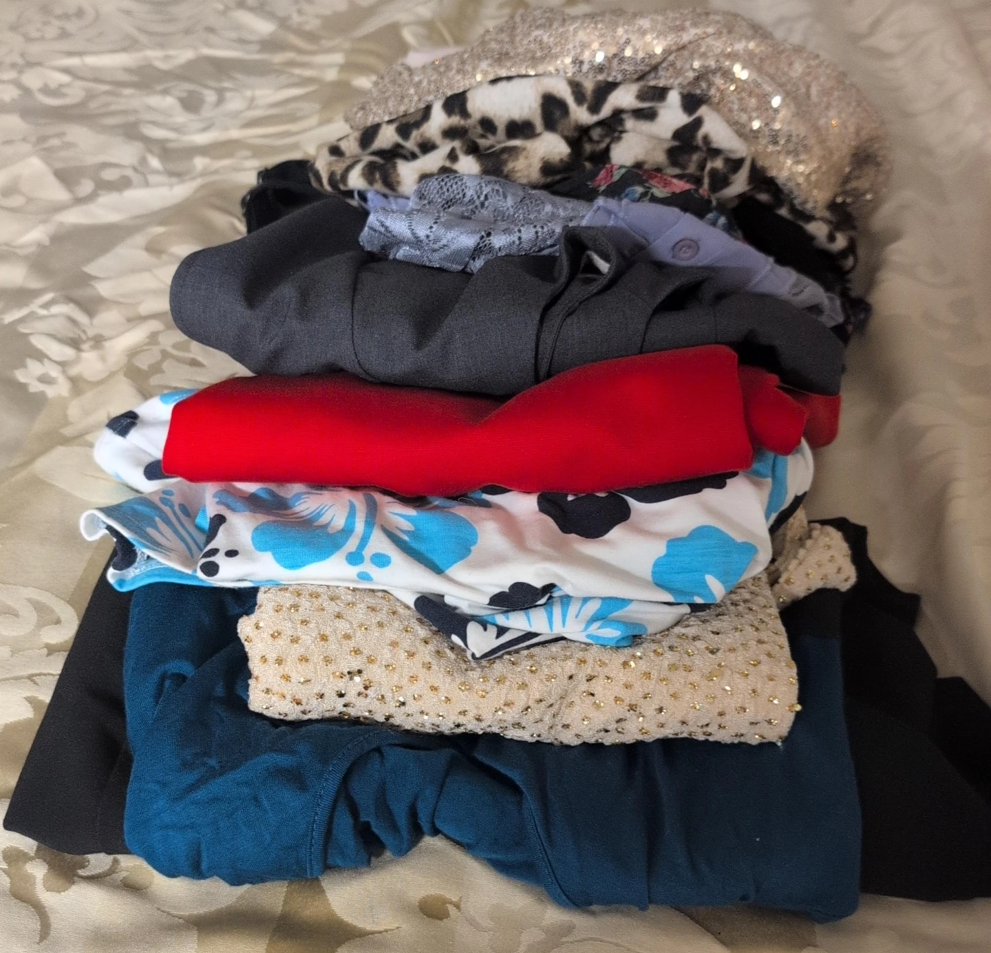 Pile of assorted women's clothing $5 each