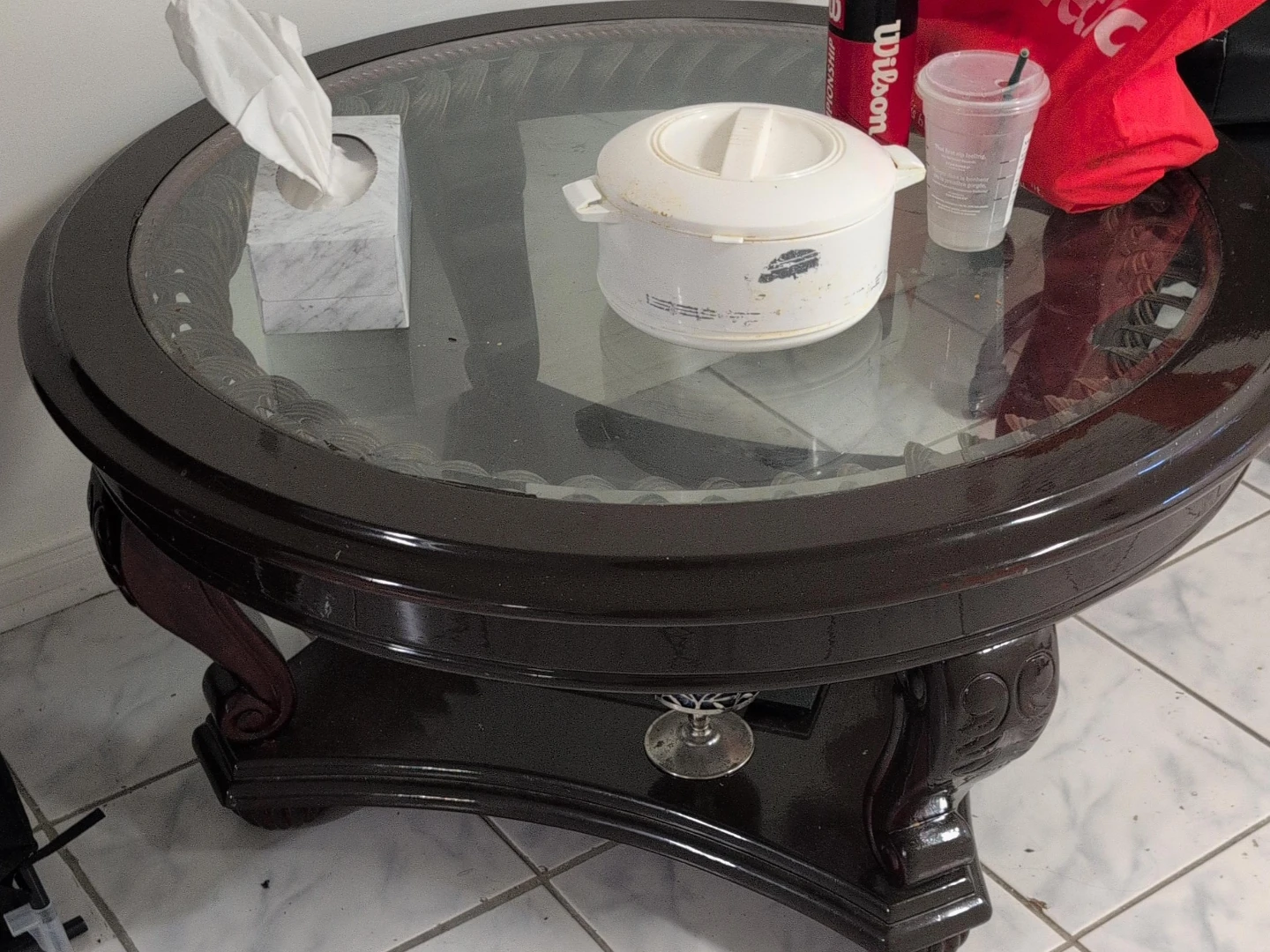 Round Dark Wood Coffee Table with Glass Top pick up as it