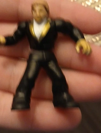 Wwe Figure in Black Suit